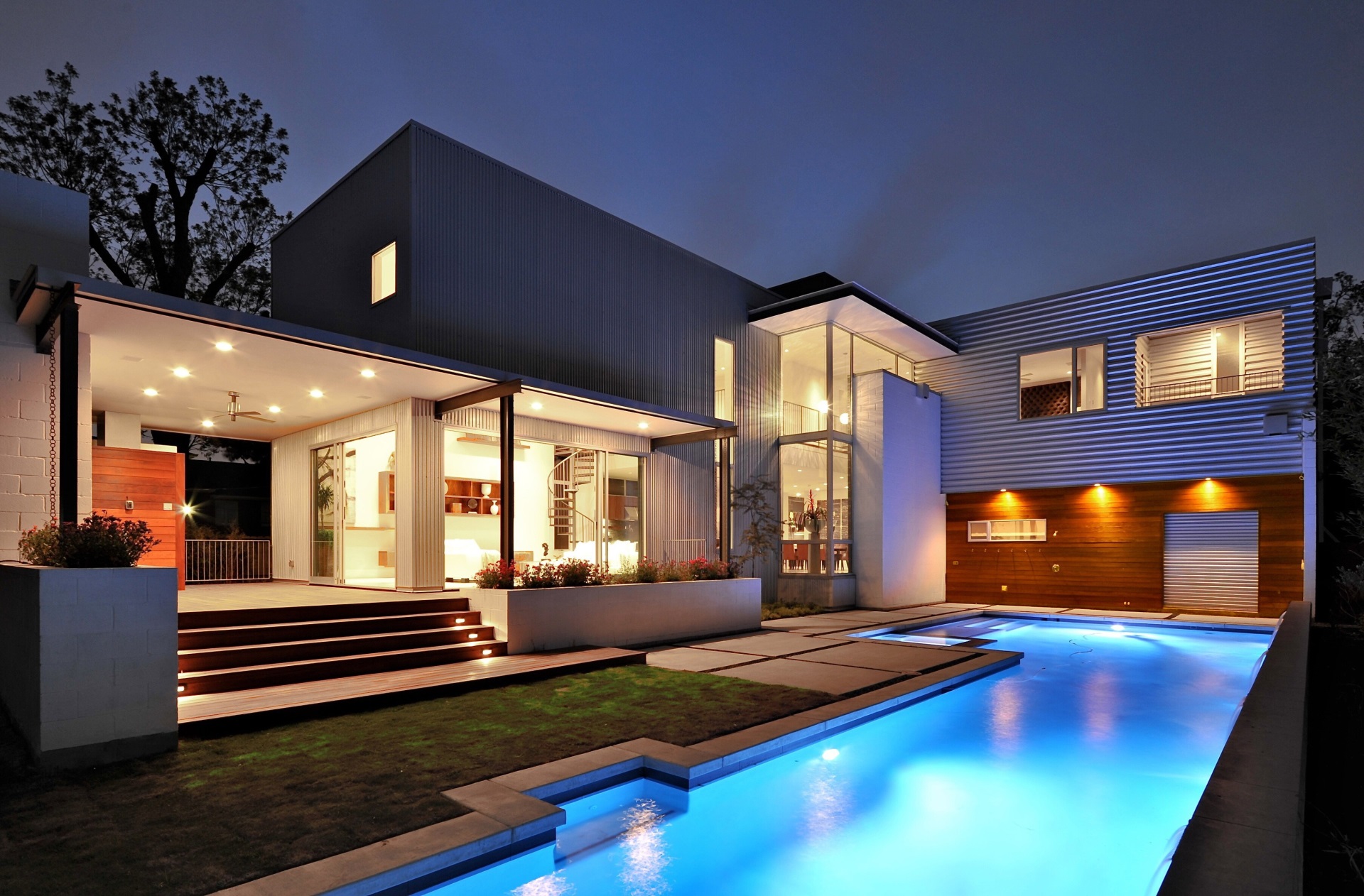 Modern house with swimming pool at night HD Wallpaper