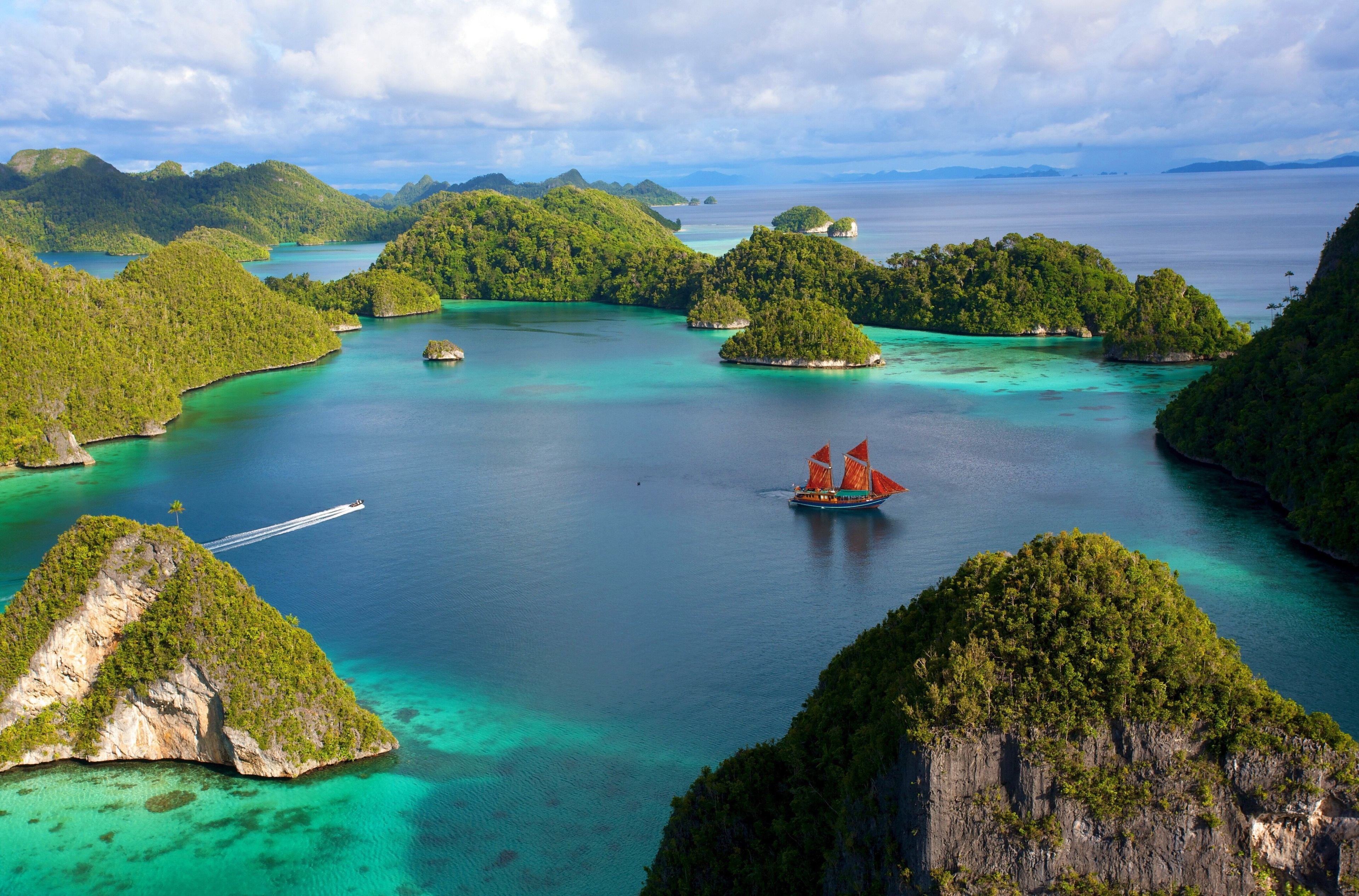Sailing ship in Raja Ampat islands 4K HD Wallpaper