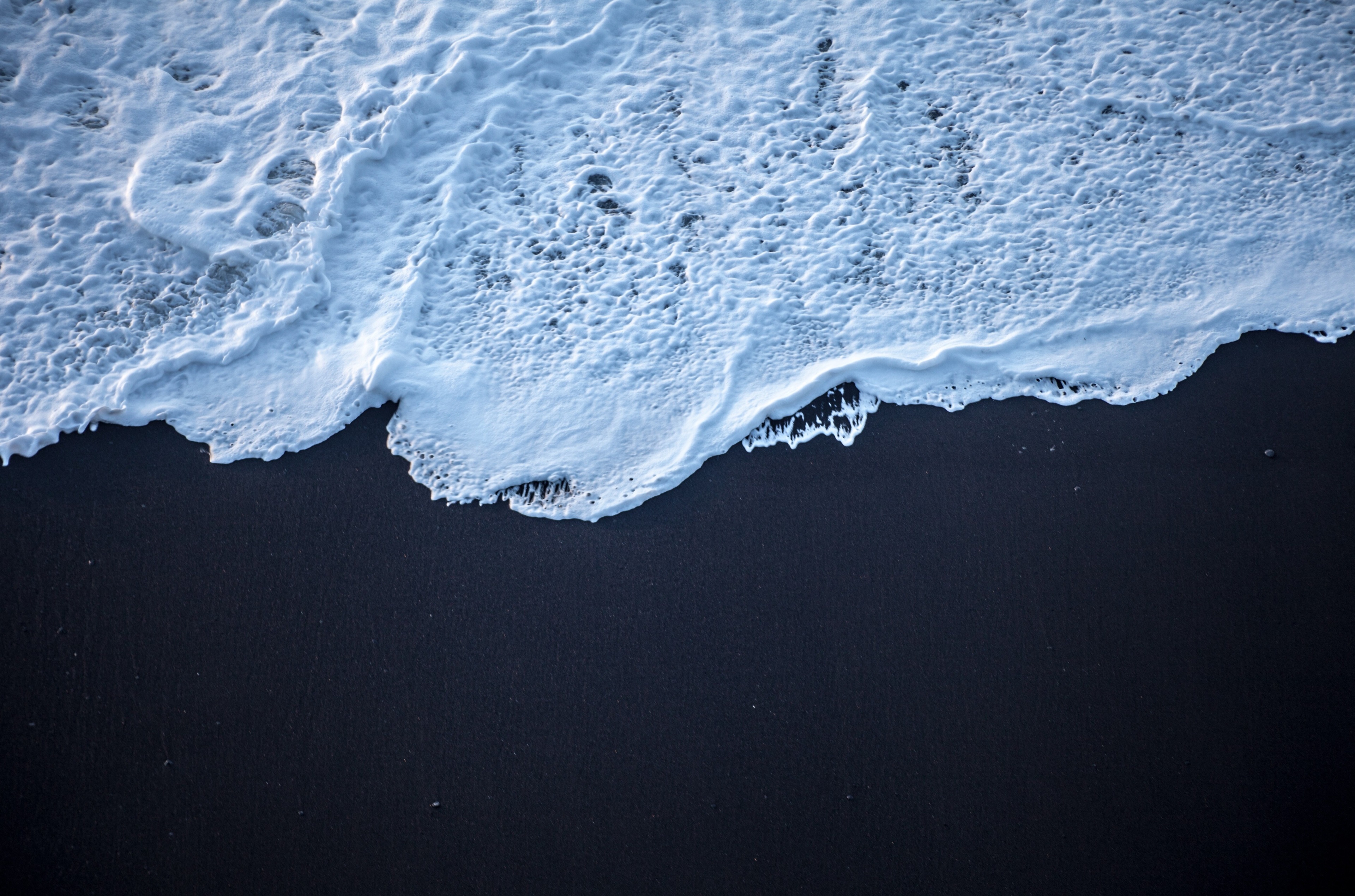 Black Sand Beach with Ocean Waves 4K HD Wallpaper