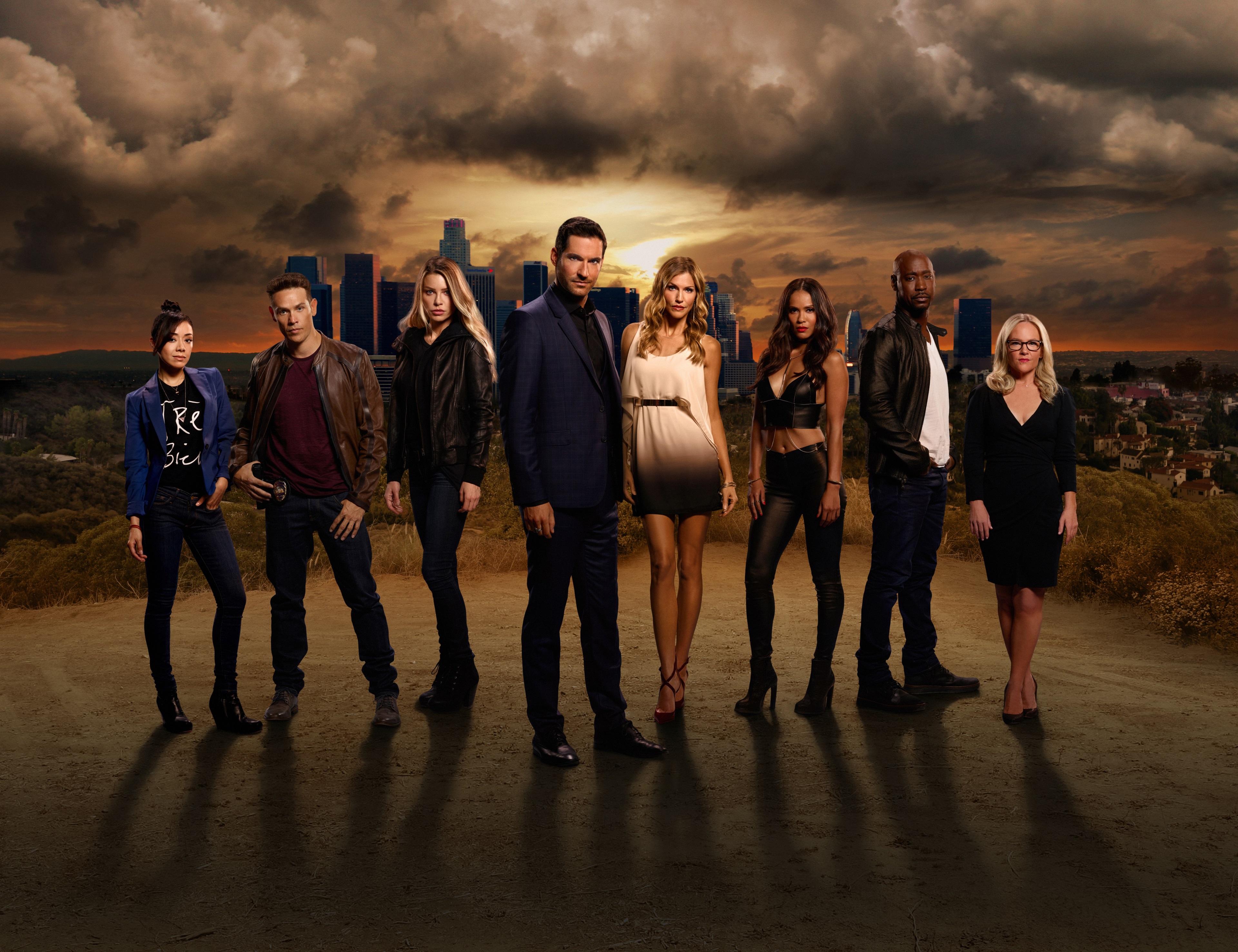 Lucifer cast in front of Los Angeles skyline HD Wallpaper