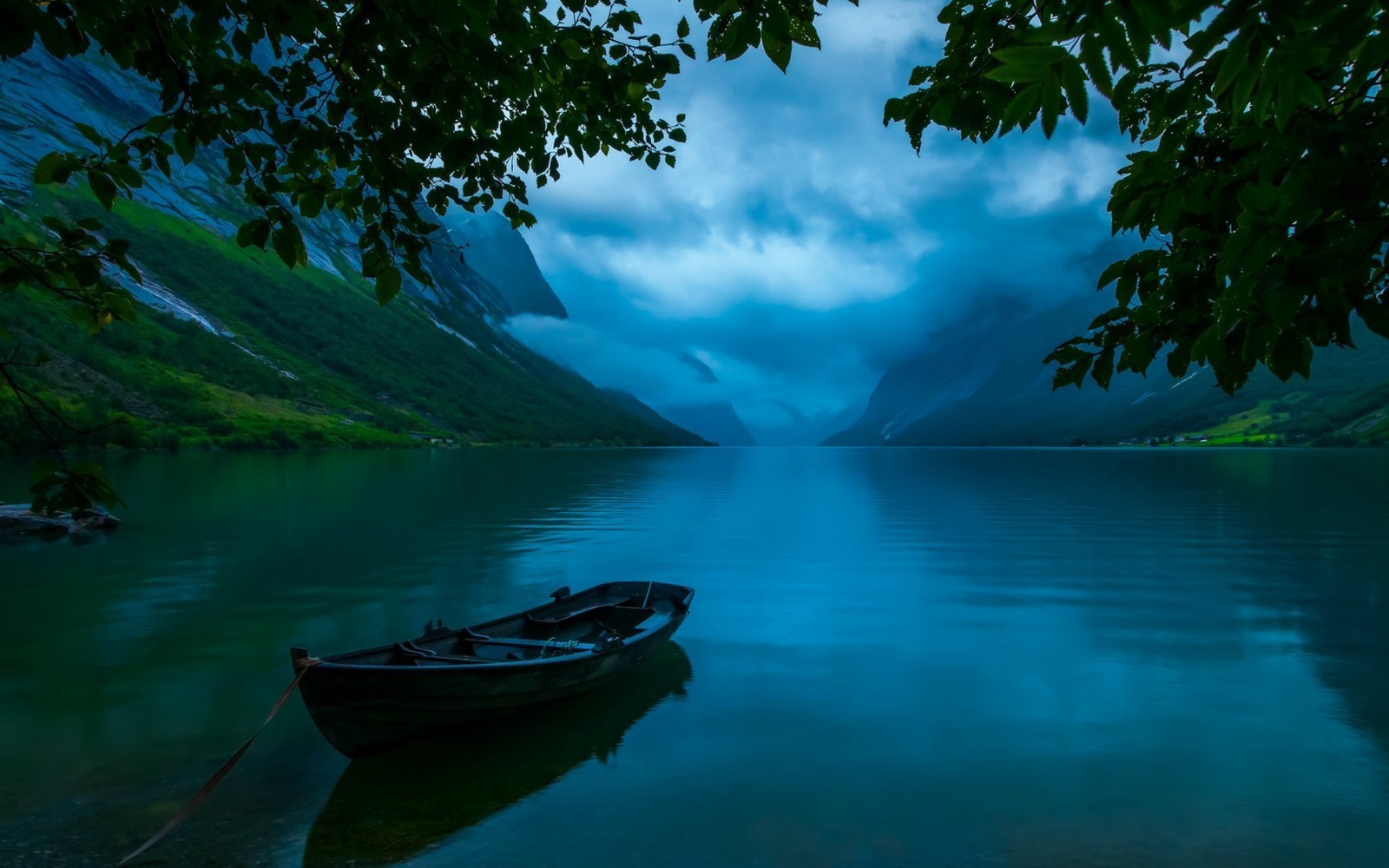 Serene Blue Lake with Boat and Mountain View in Norway HD Wallpaper