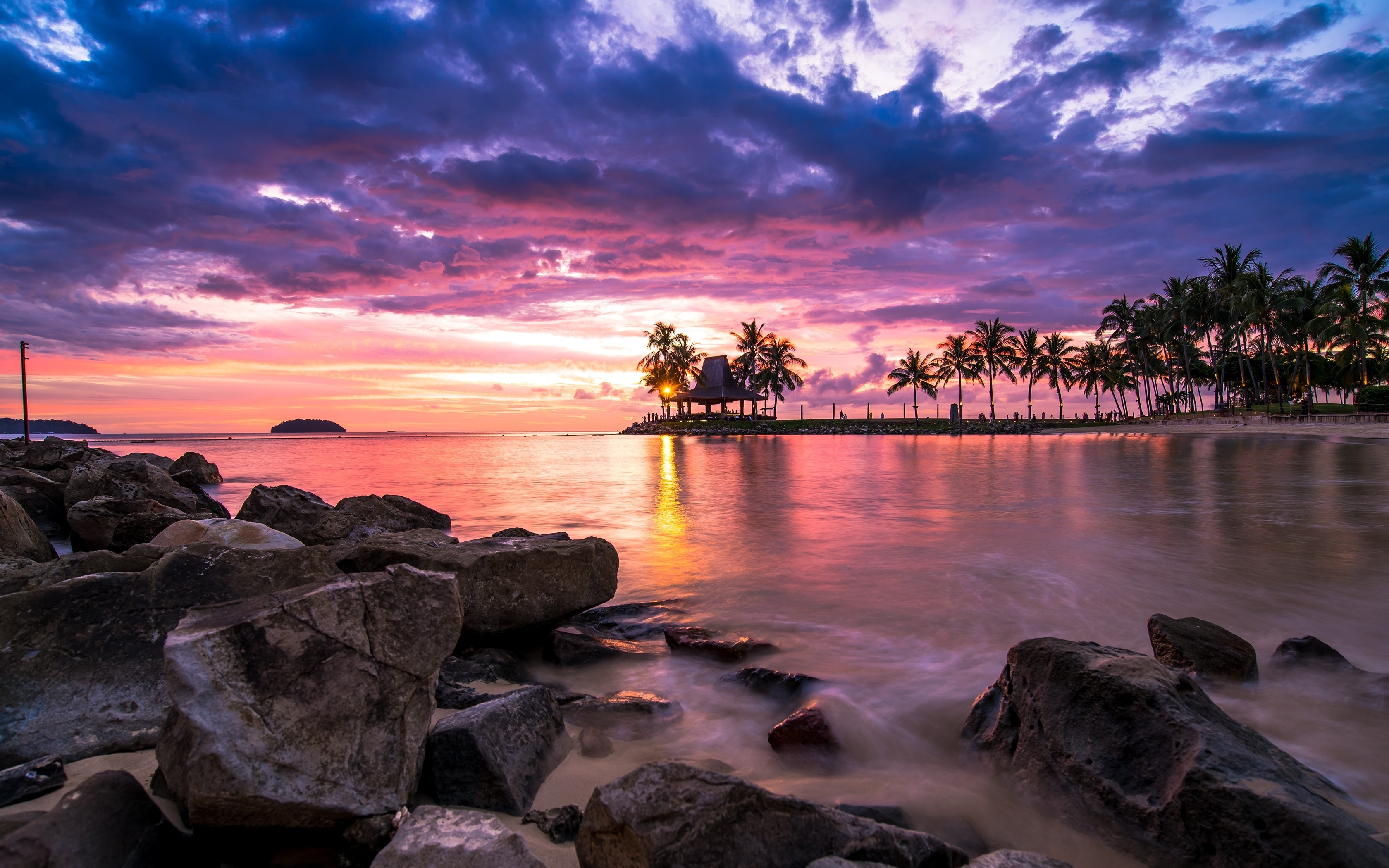 Sunset Over Tropical Beach with Palm Trees and Rocks HD Wallpaper