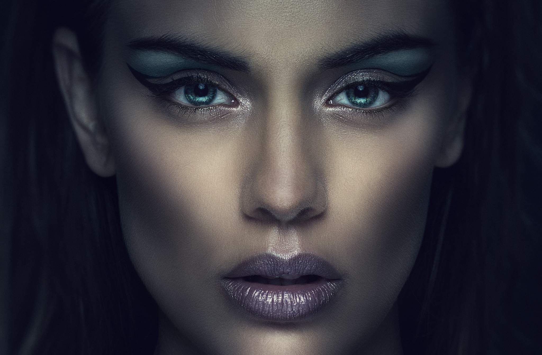 Woman with dramatic makeup and blue eyeshadow HD Wallpaper