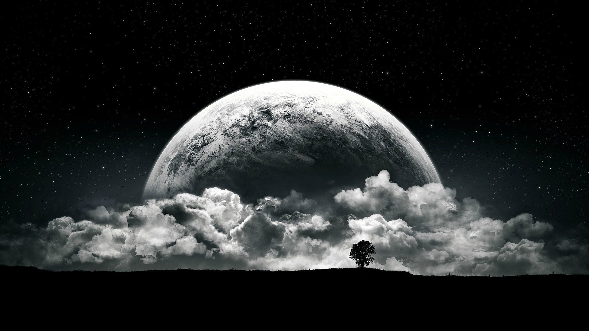 Dark night sky with a large moon and clouds over a silhouette landscape with a tree HD Wallpaper