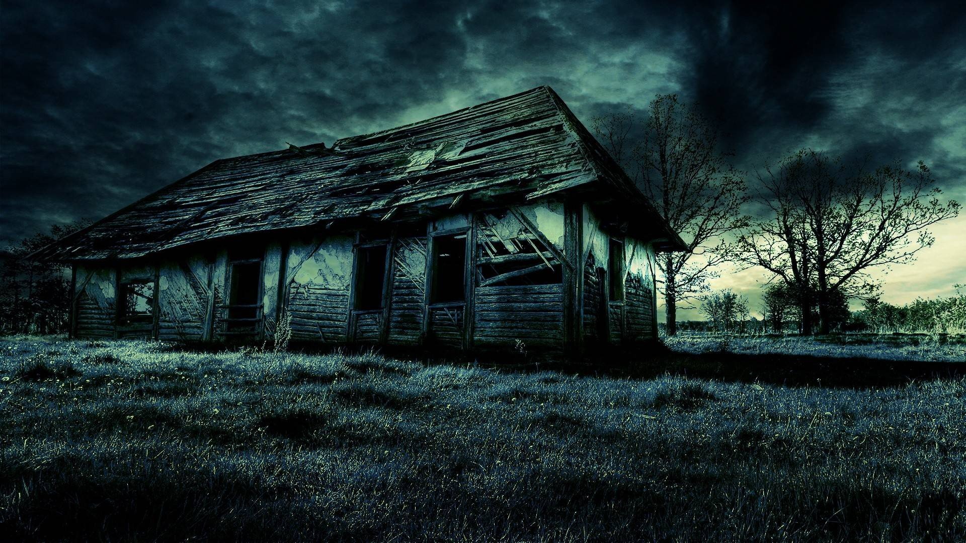 Abandoned house under a dark, stormy sky HD Wallpaper