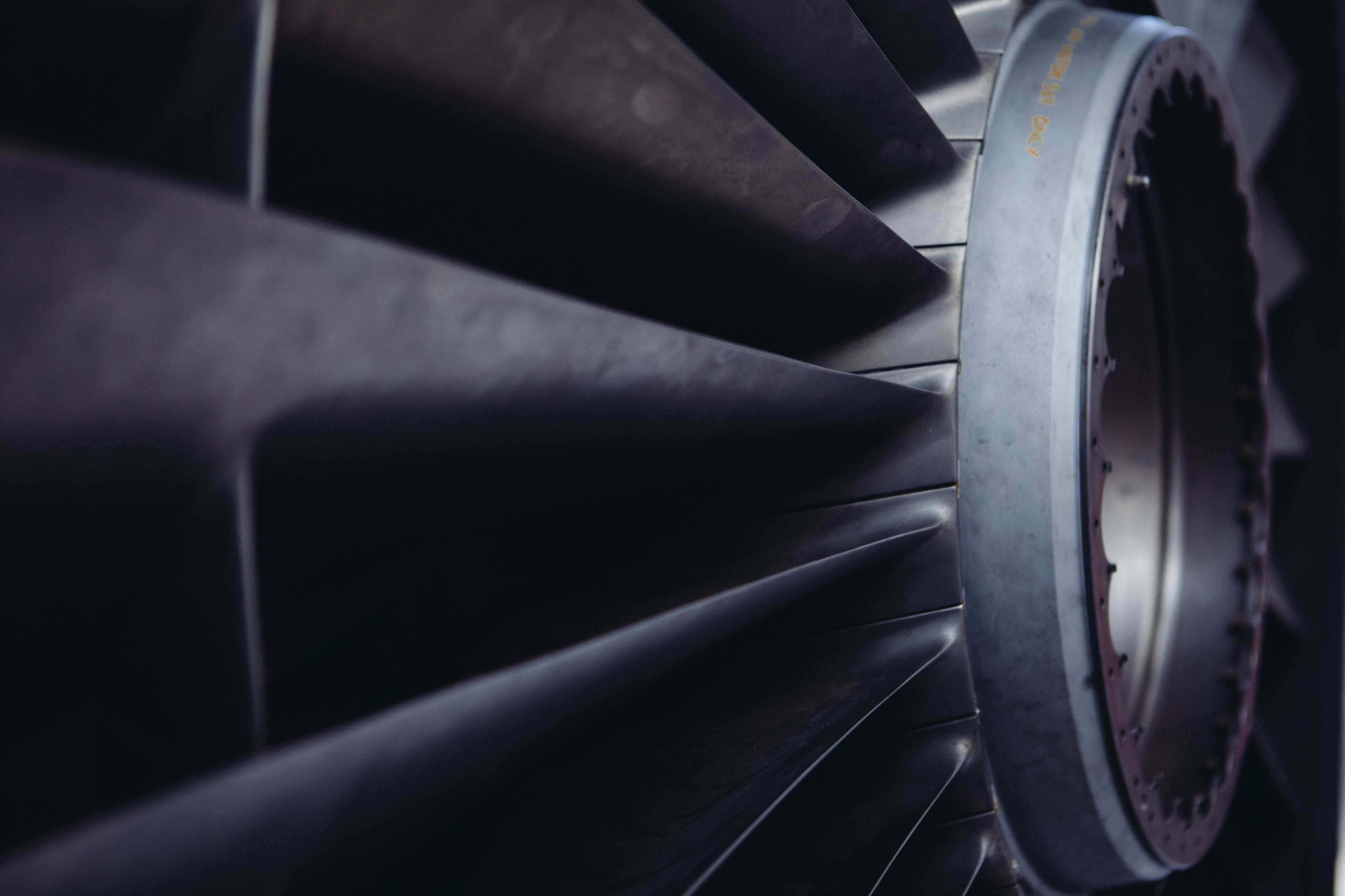 Close-up of a jet engine turbine HD Wallpaper