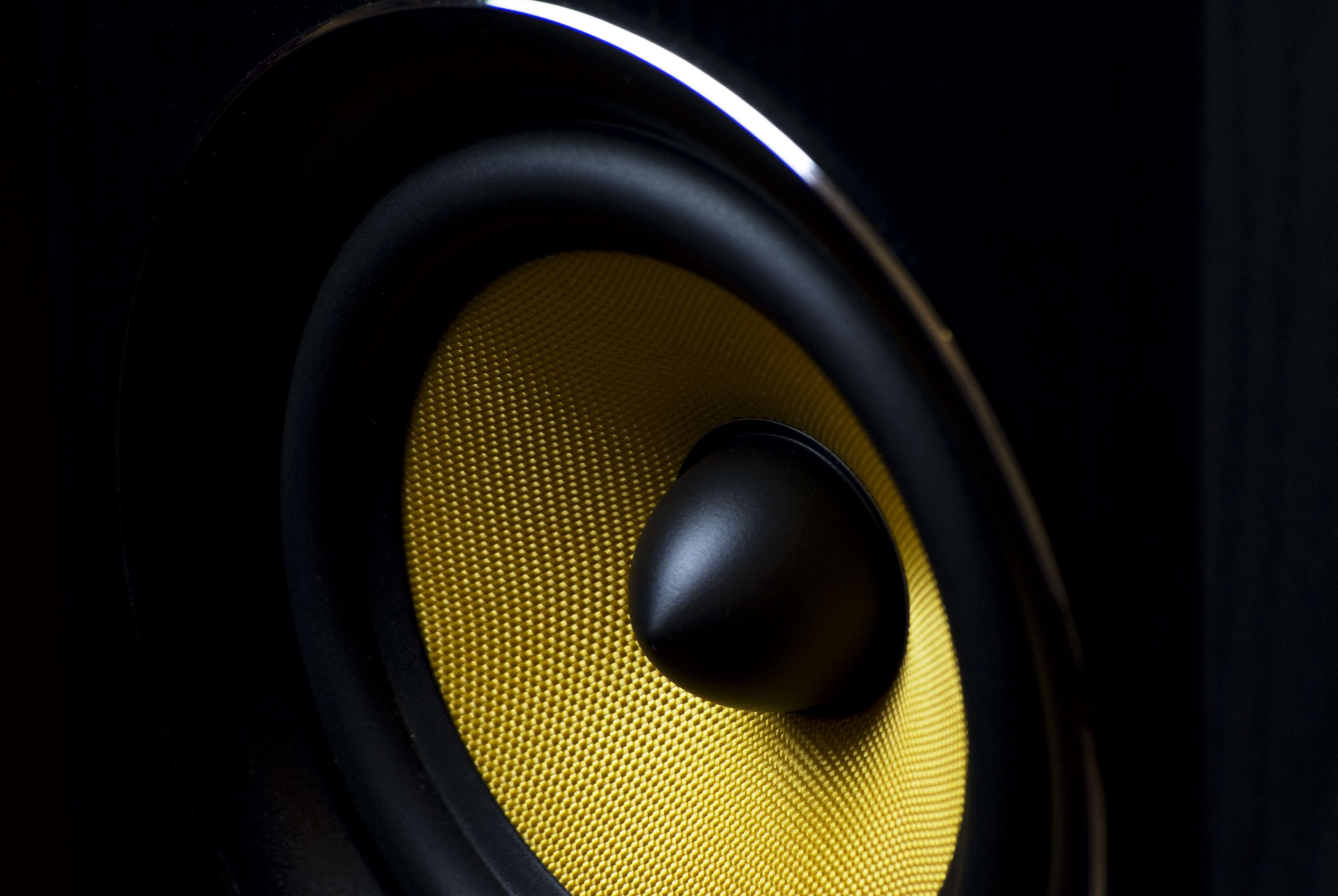 Close-up of a yellow speaker cone HD Wallpaper
