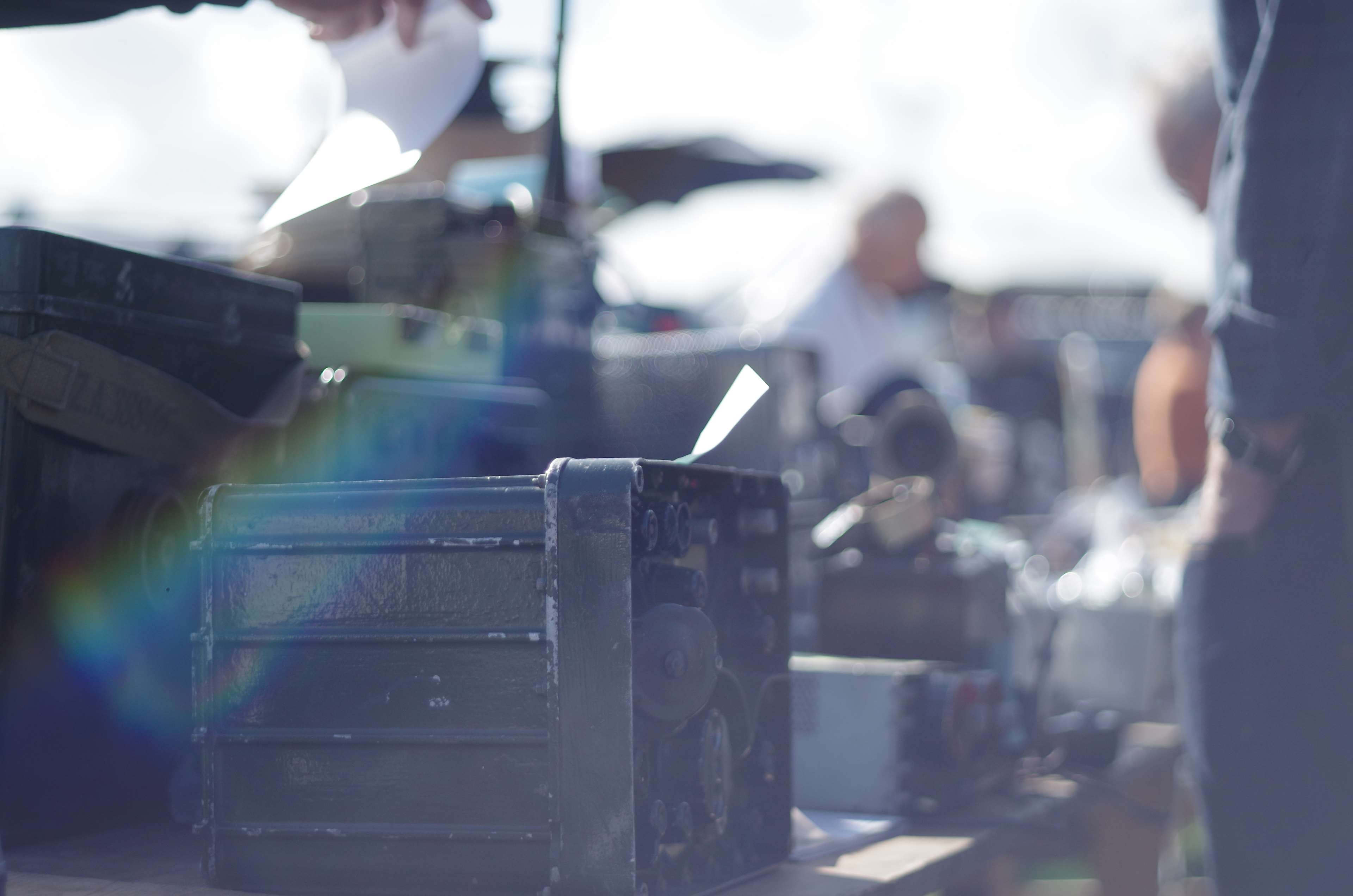 Vintage military radio equipment at a market HD Wallpaper