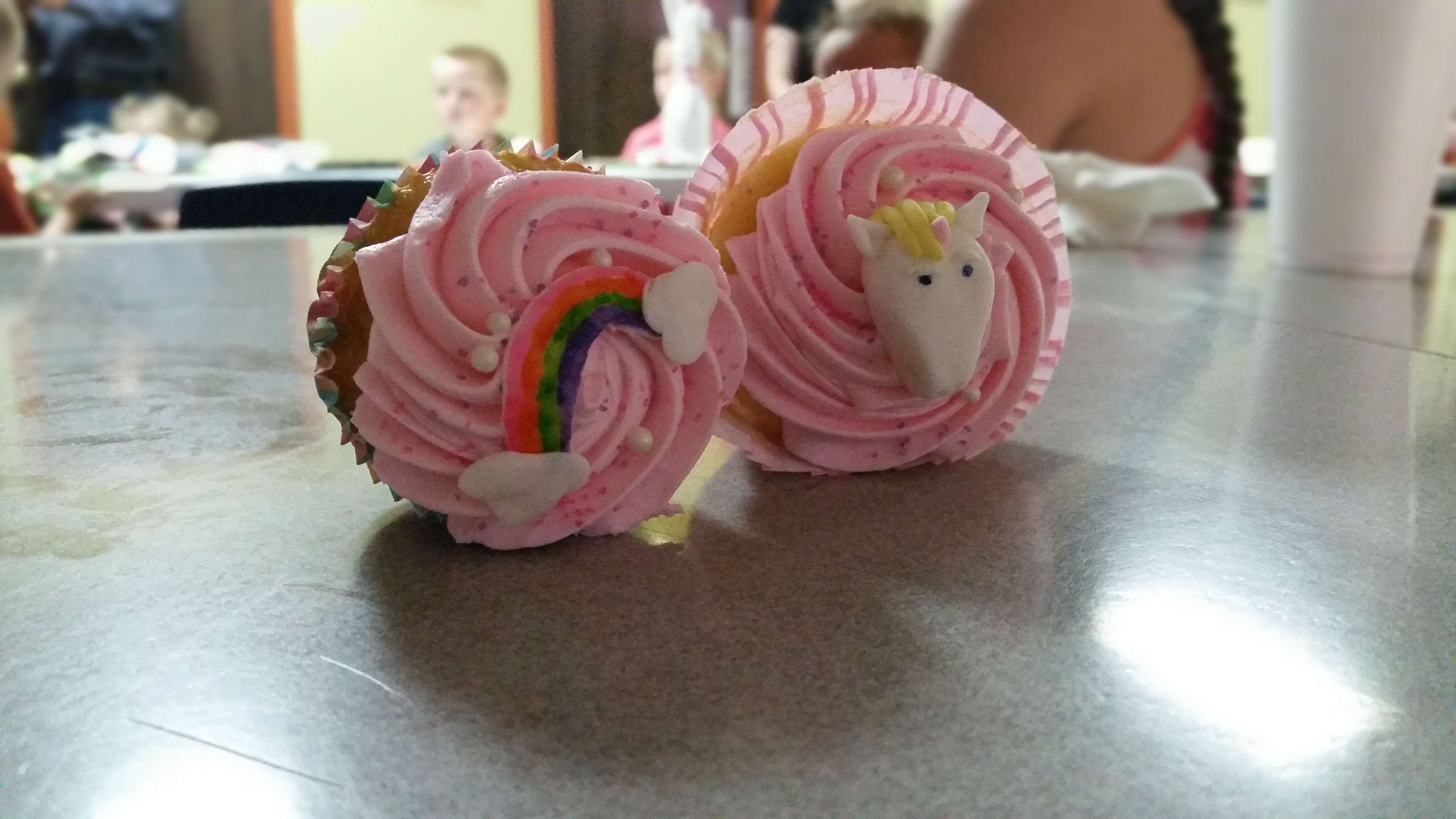 Pink cupcakes with rainbow and unicorn decorations HD Wallpaper
