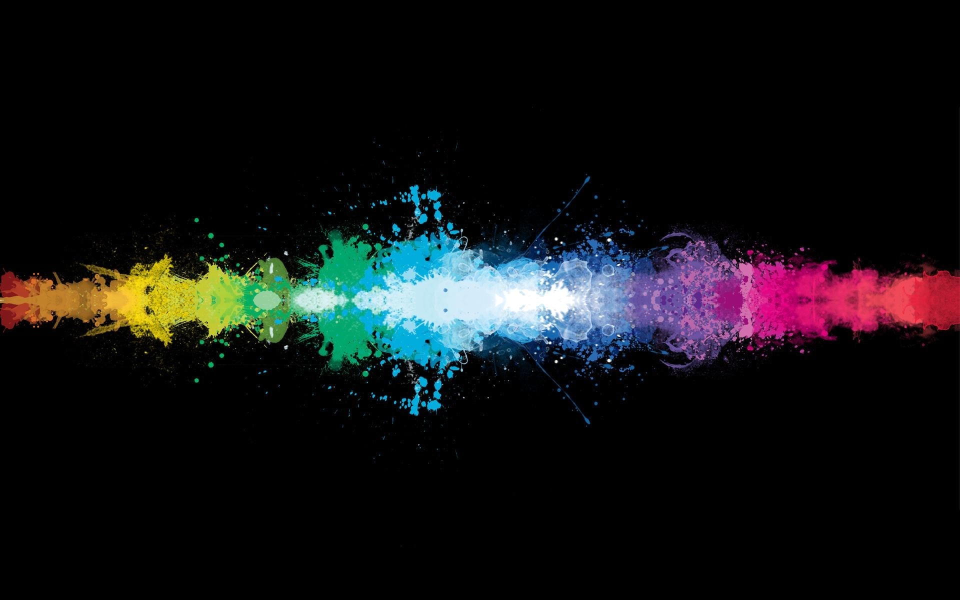Colorful paint splatters in a line on black background HD Wallpaper
