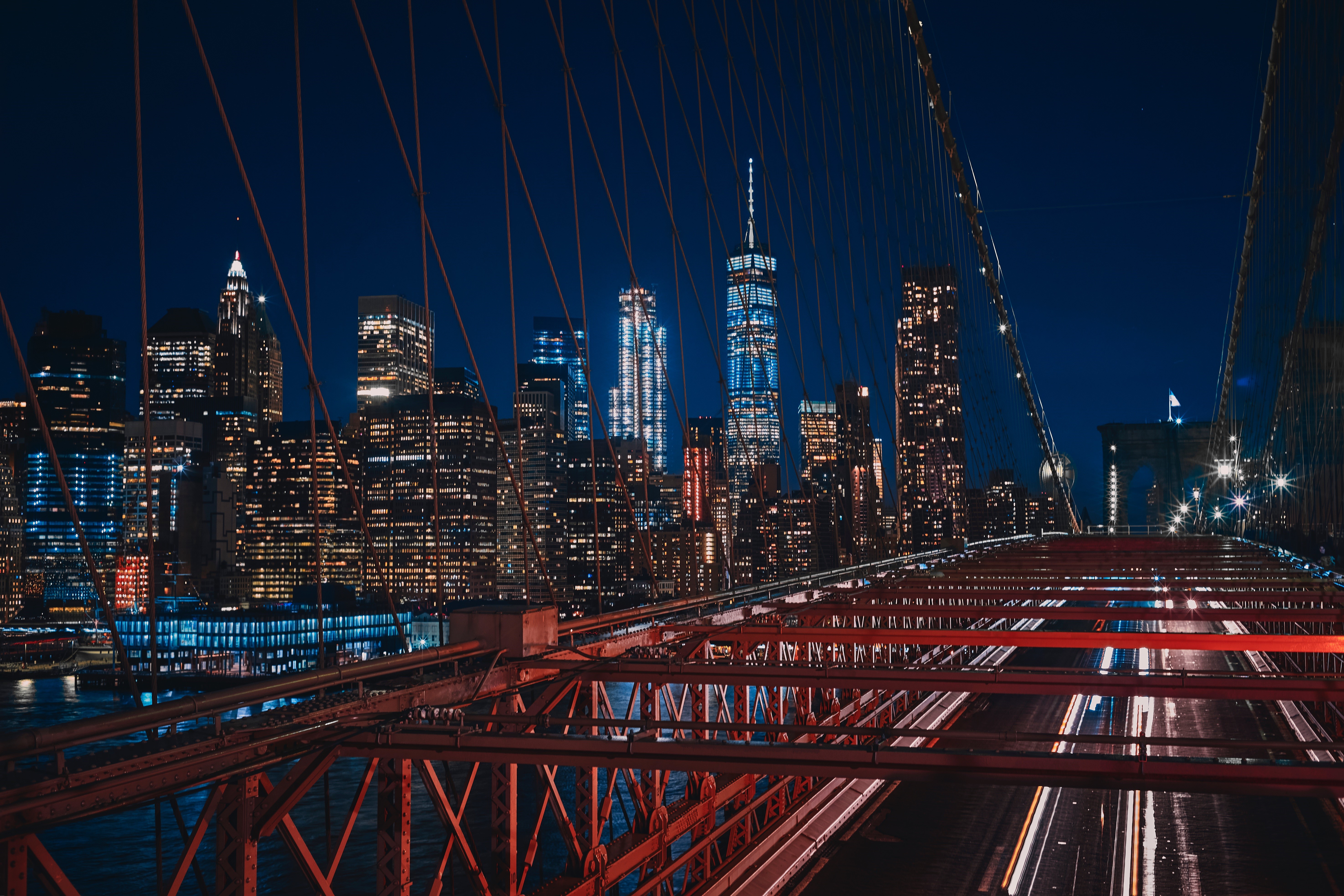 New York City skyline and Brooklyn Bridge at night HD Wallpaper