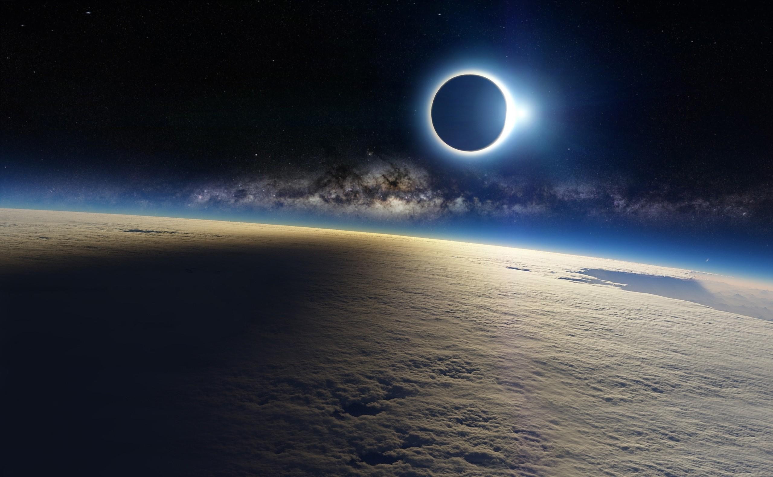 Solar eclipse over Earth with Milky Way galaxy HD Wallpaper