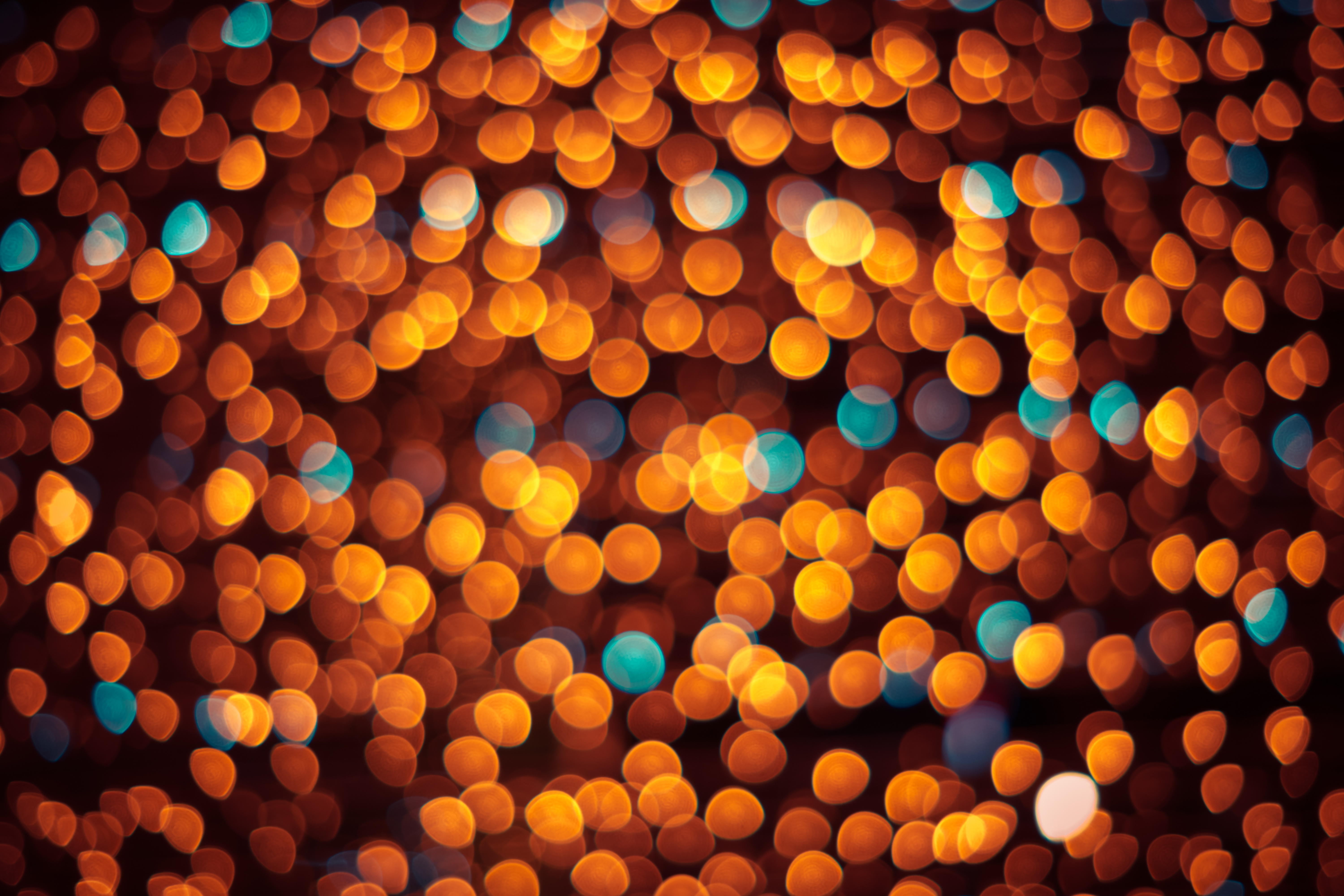 Vibrant Orange and Teal Bokeh Lights 4K HD Wallpaper