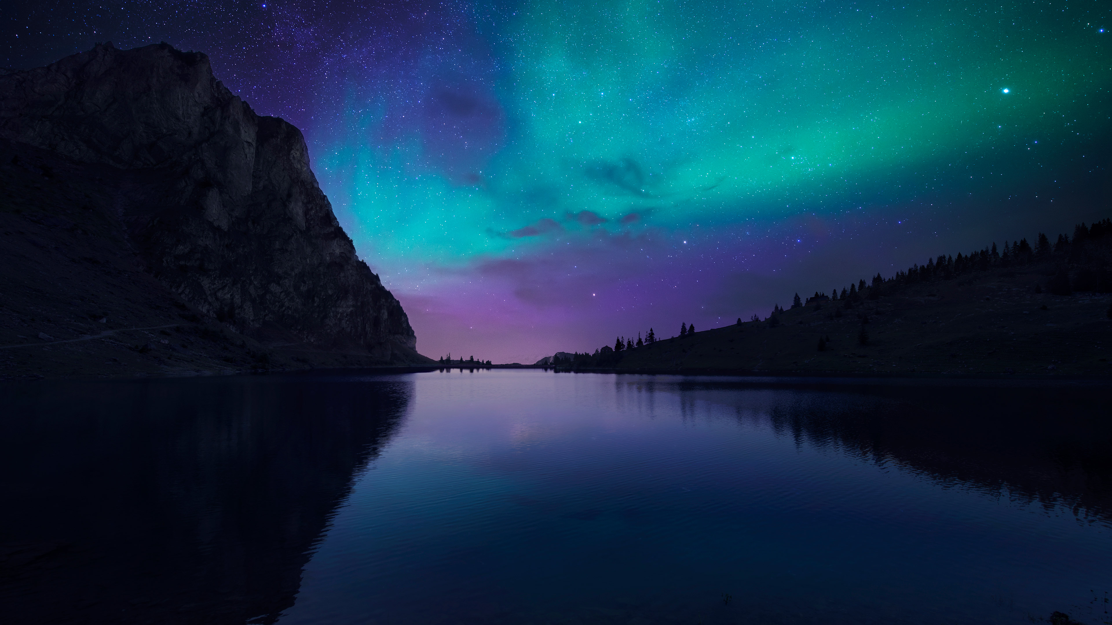 Aurora over a mountain lake at night HD Wallpaper