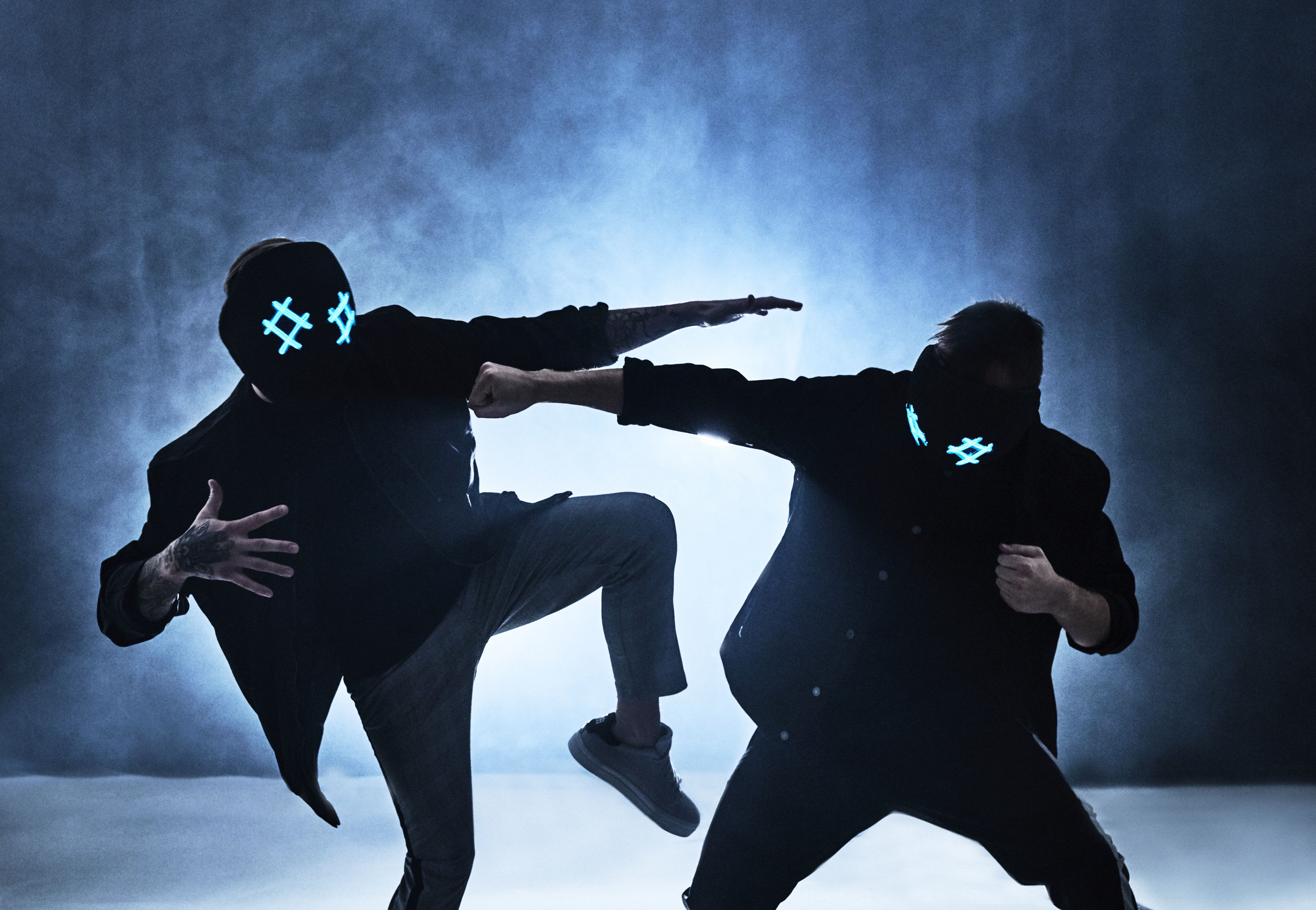 Tungevaag and Raaban DJs wearing neon masks HD Wallpaper