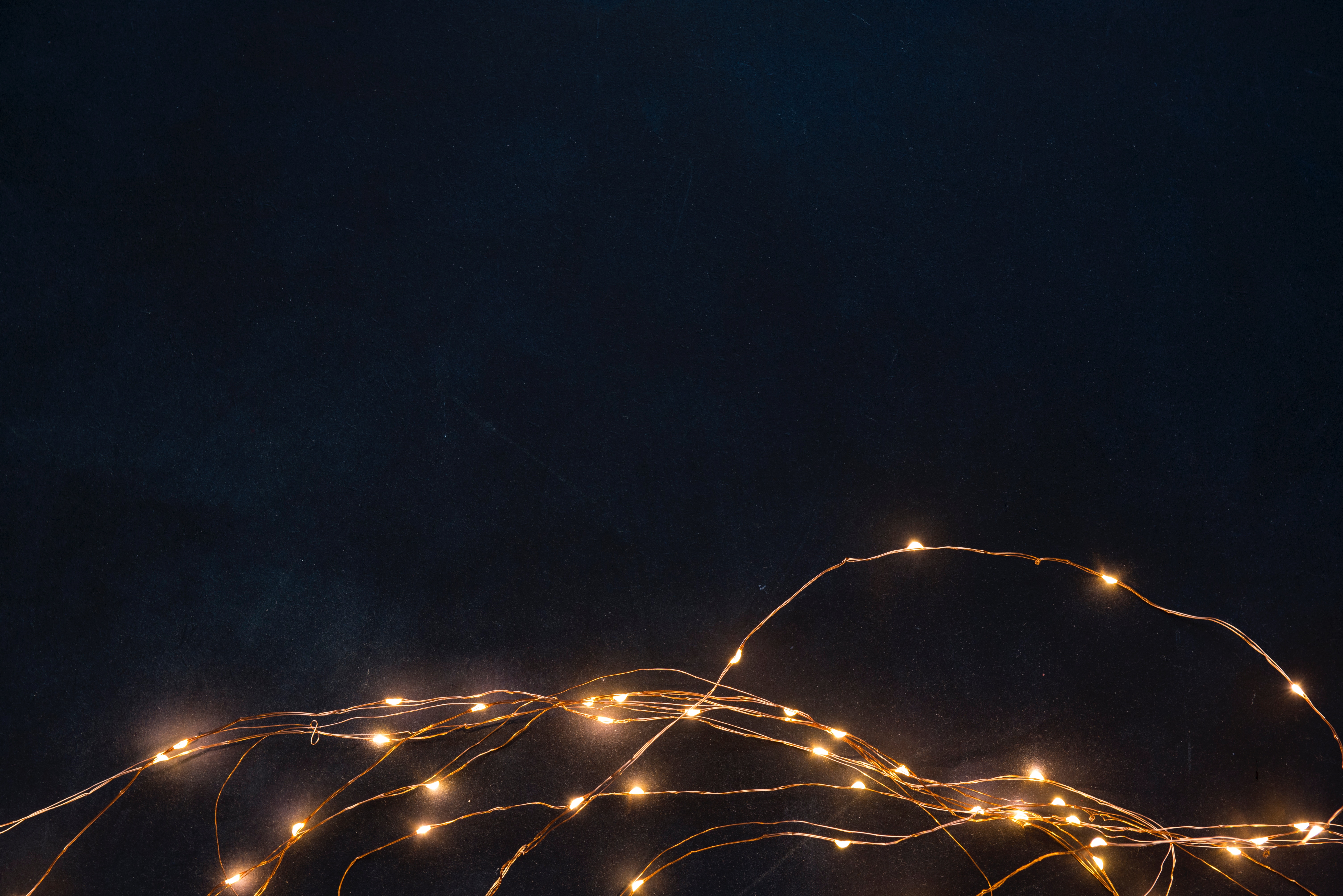 Fairy lights on a dark background HD Wallpaper