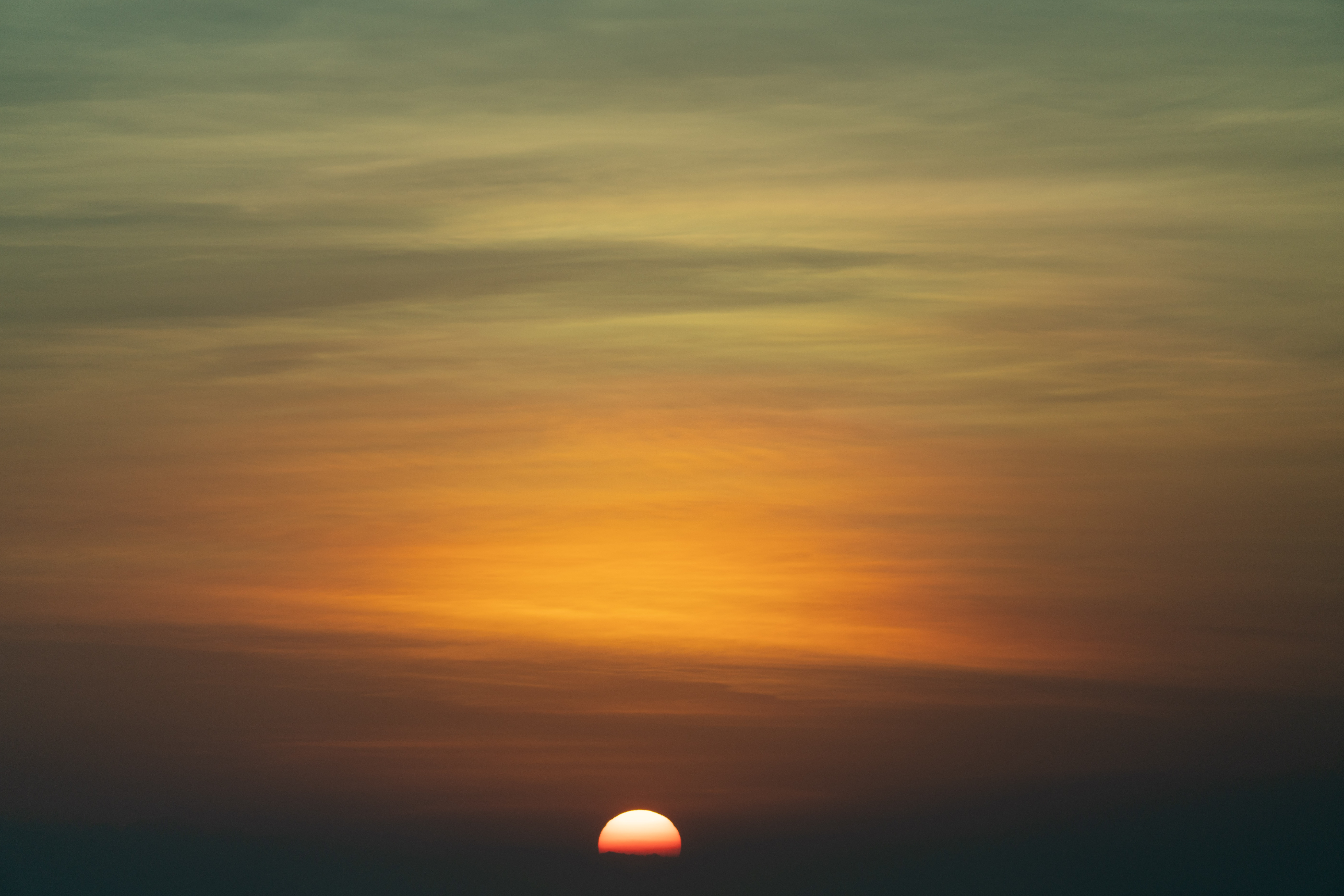 Sunset over hazy sky in Bali, Indonesia HD Wallpaper
