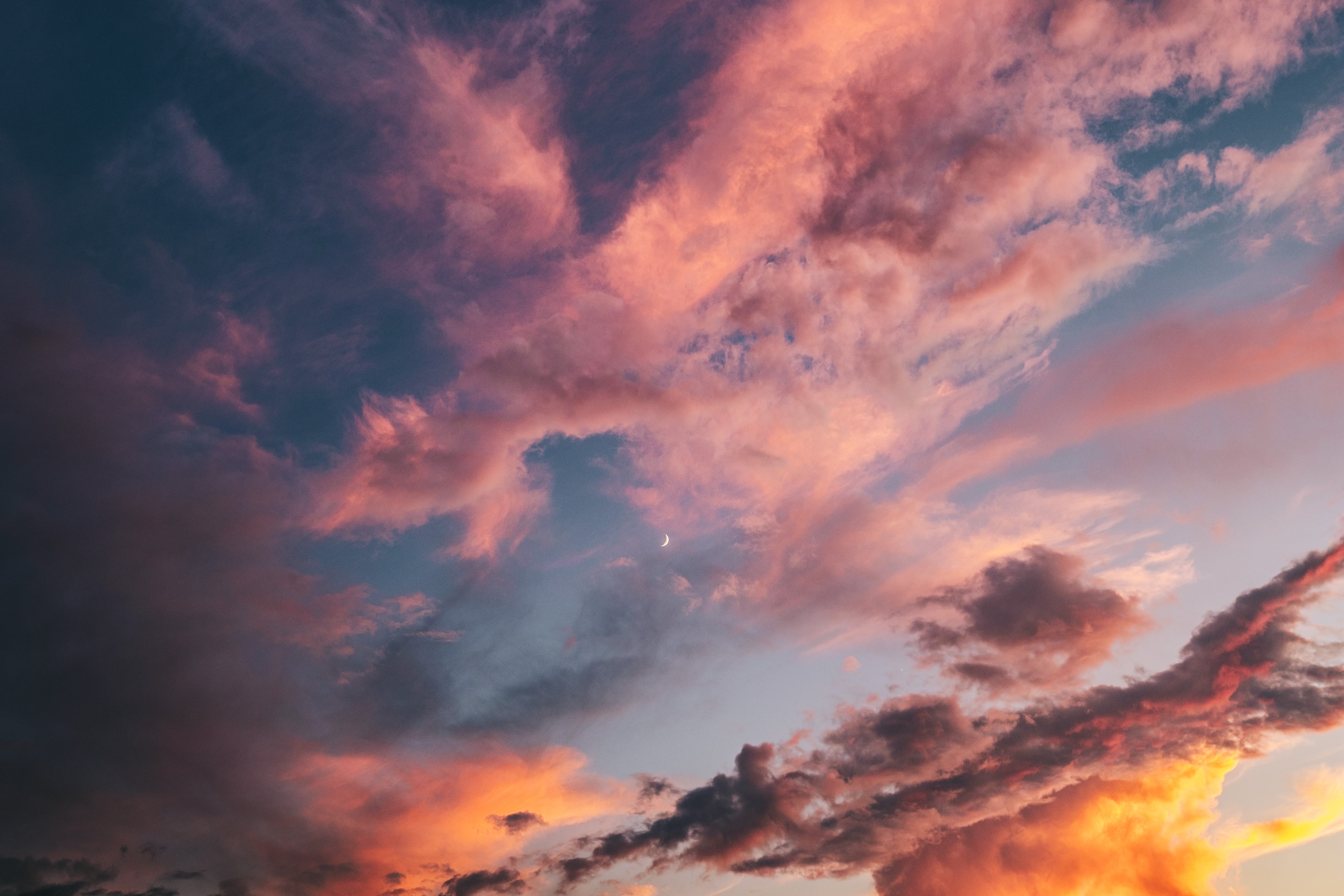Pink and orange clouds with a crescent moon HD Wallpaper