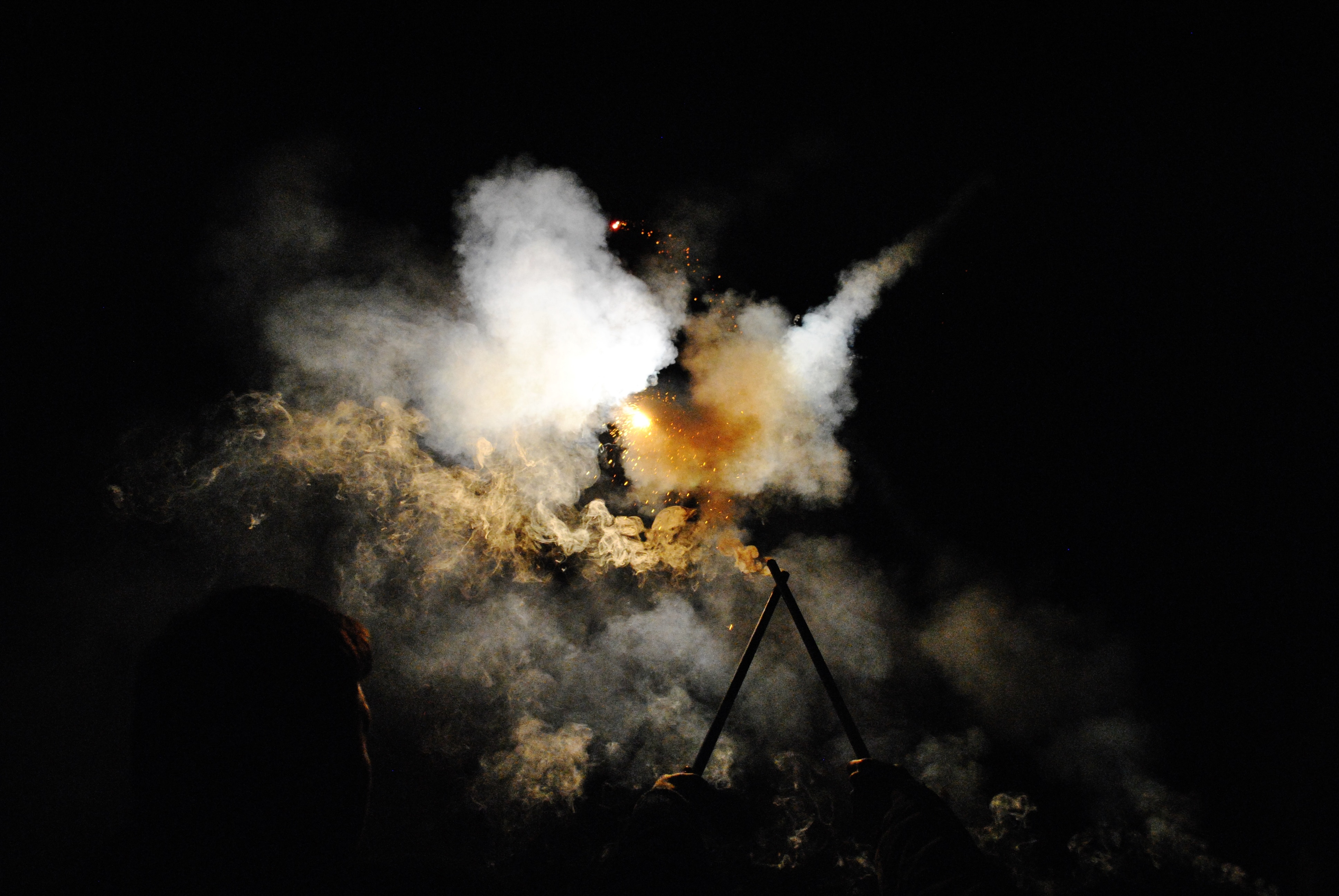 People holding flares in the dark HD Wallpaper