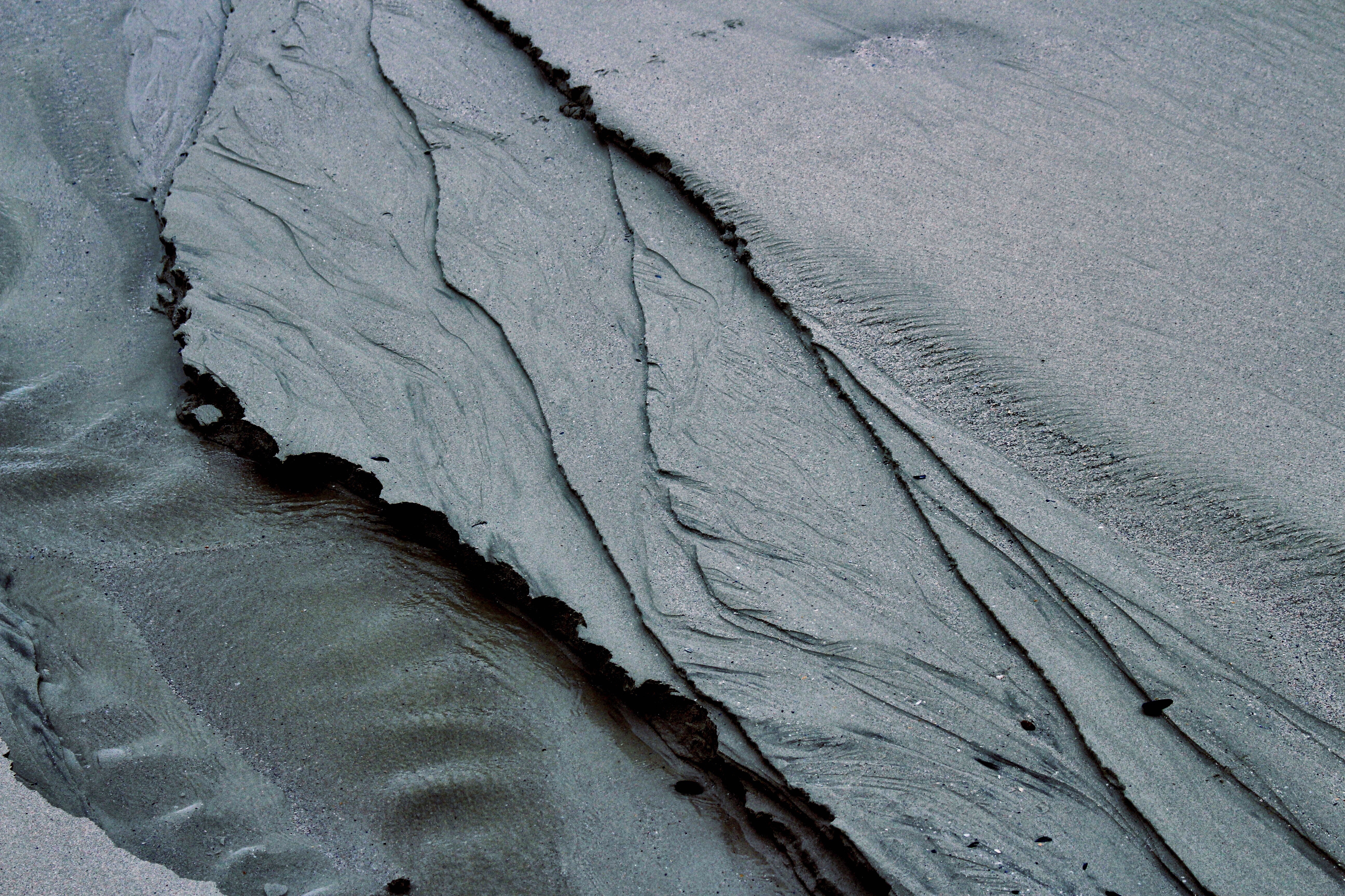 Sand texture with water erosion patterns HD Wallpaper