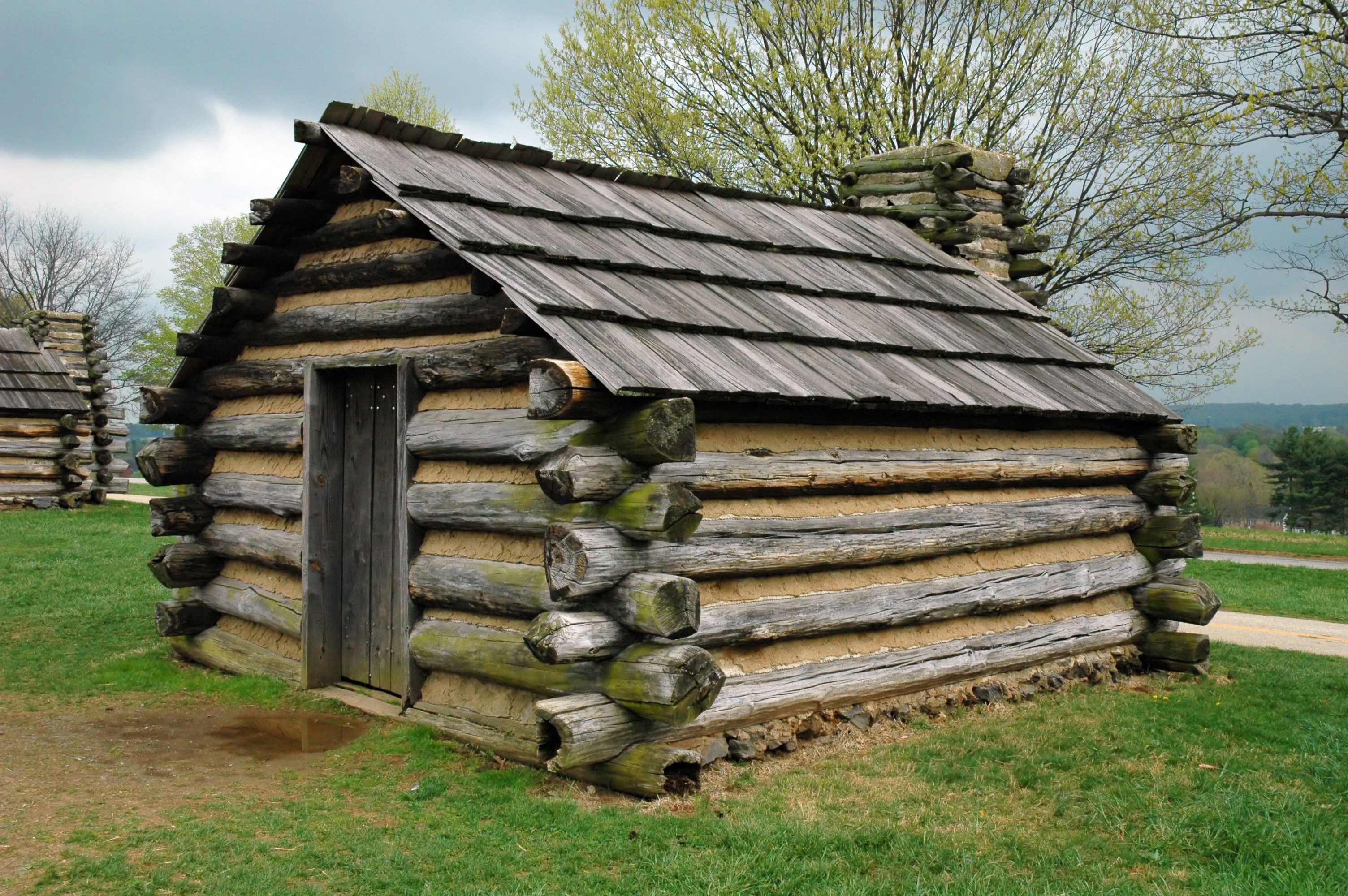 Log cabin with wooden roof and stone chimney HD Wallpaper