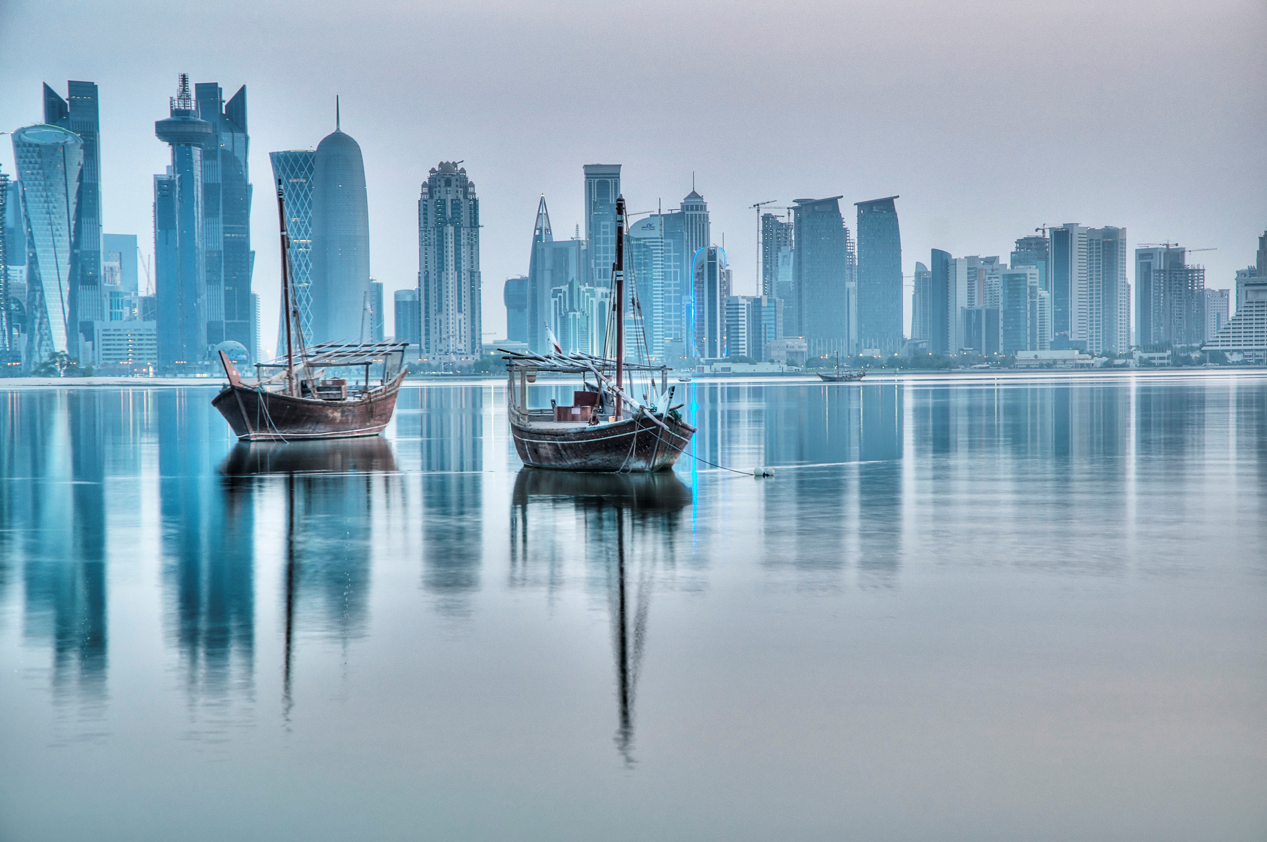 Doha skyline with traditional boats HD Wallpaper