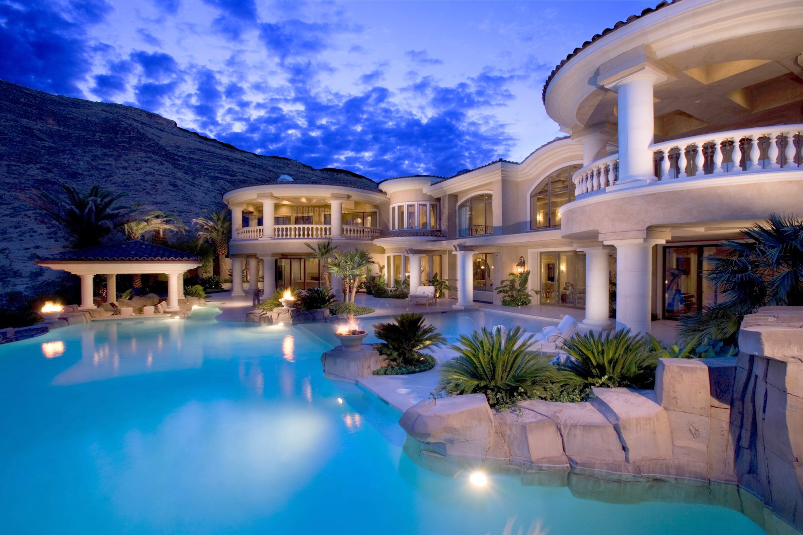 Luxury mansion with swimming pool at dusk HD Wallpaper