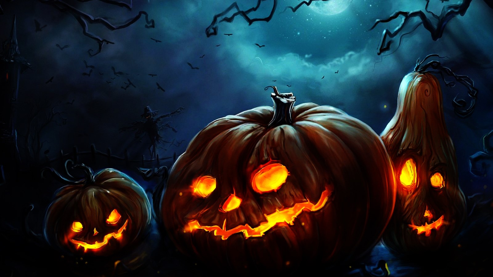 Halloween night with carved pumpkins and a scarecrow HD Wallpaper