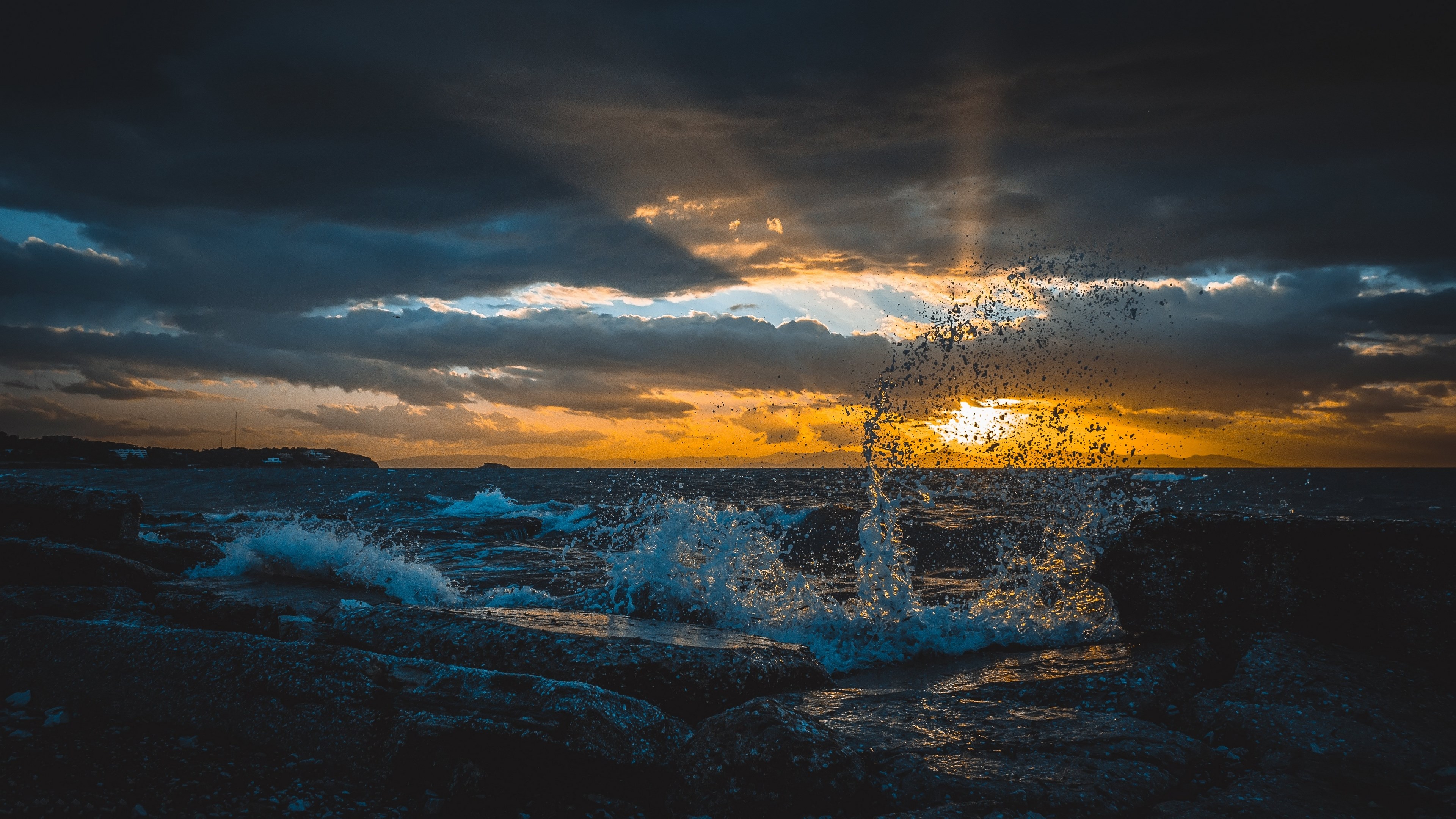 4K Stunning Ocean Wave Splash at Sunset HD Wallpaper