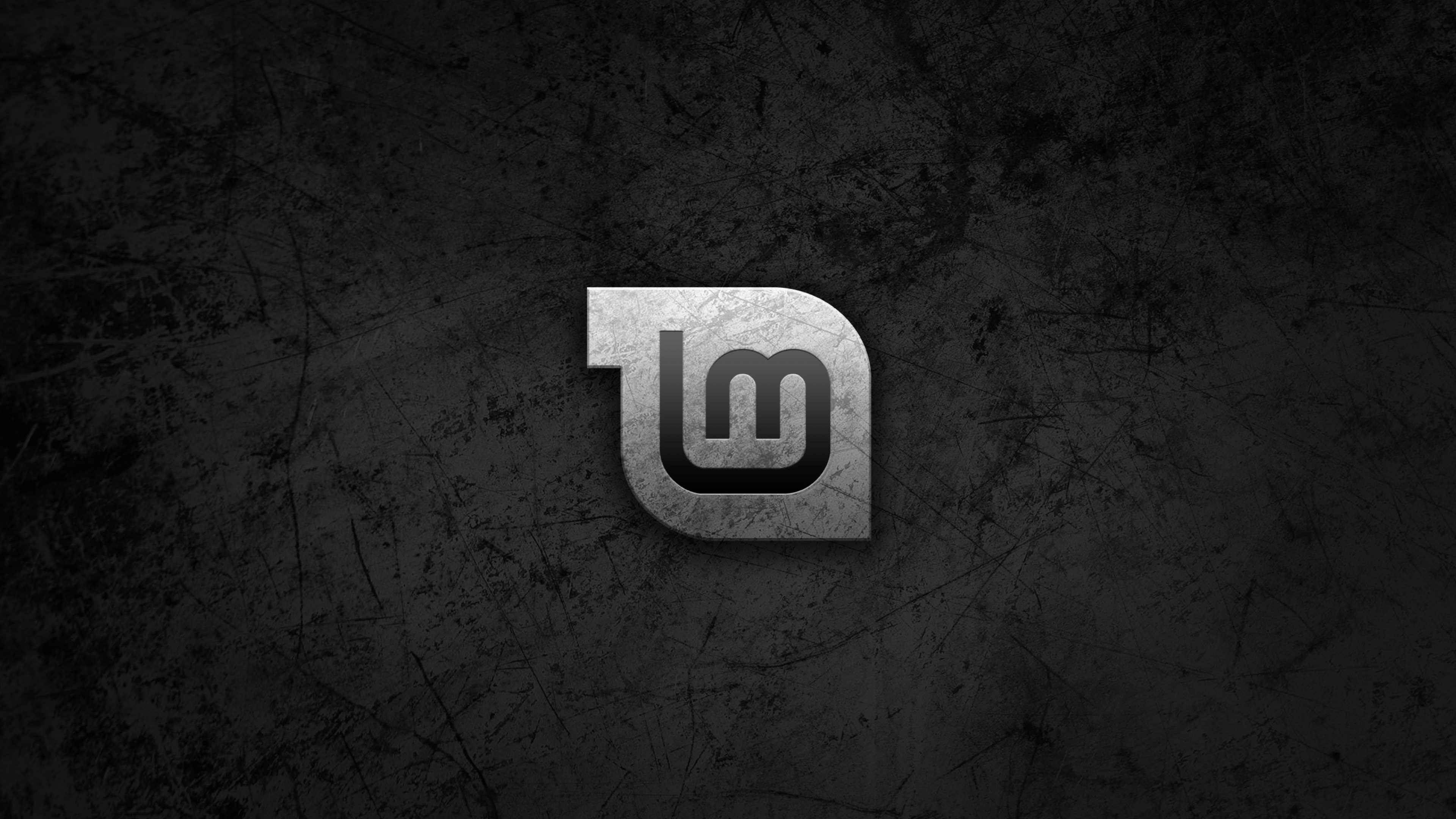 Linux Mint logo on dark textured background 4K HD Wallpaper