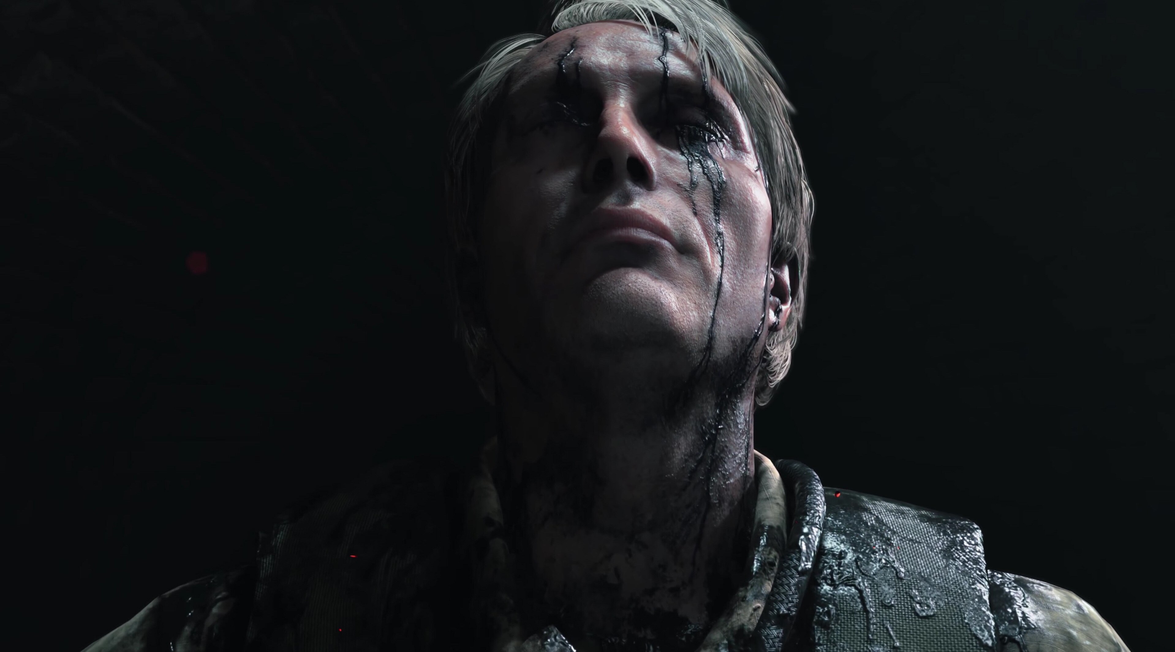 Man with black substance on face from Death Stranding HD Wallpaper