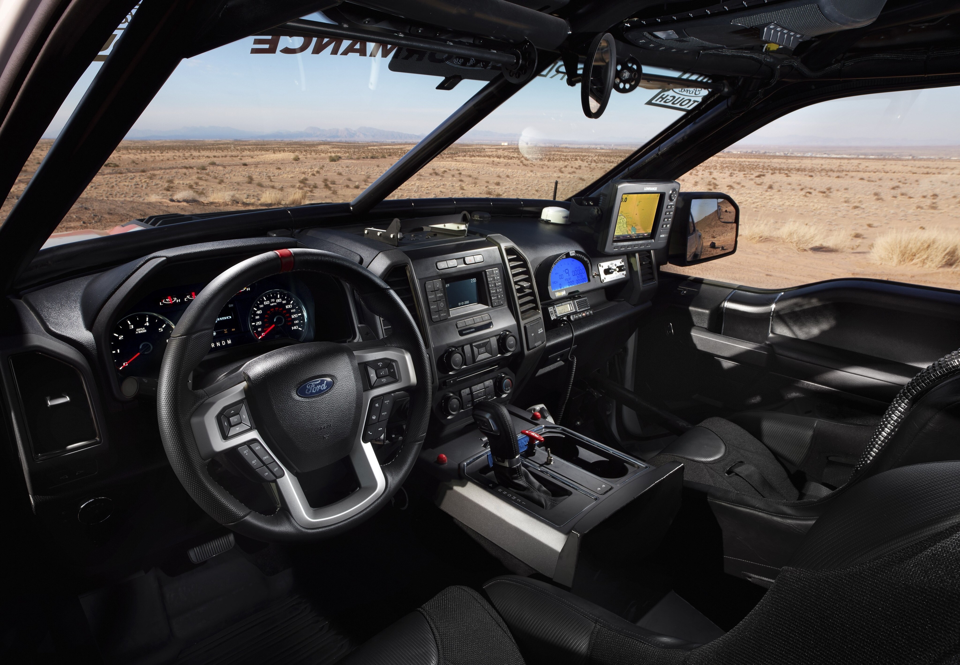 Ford F-150 Raptor interior in desert HD Wallpaper