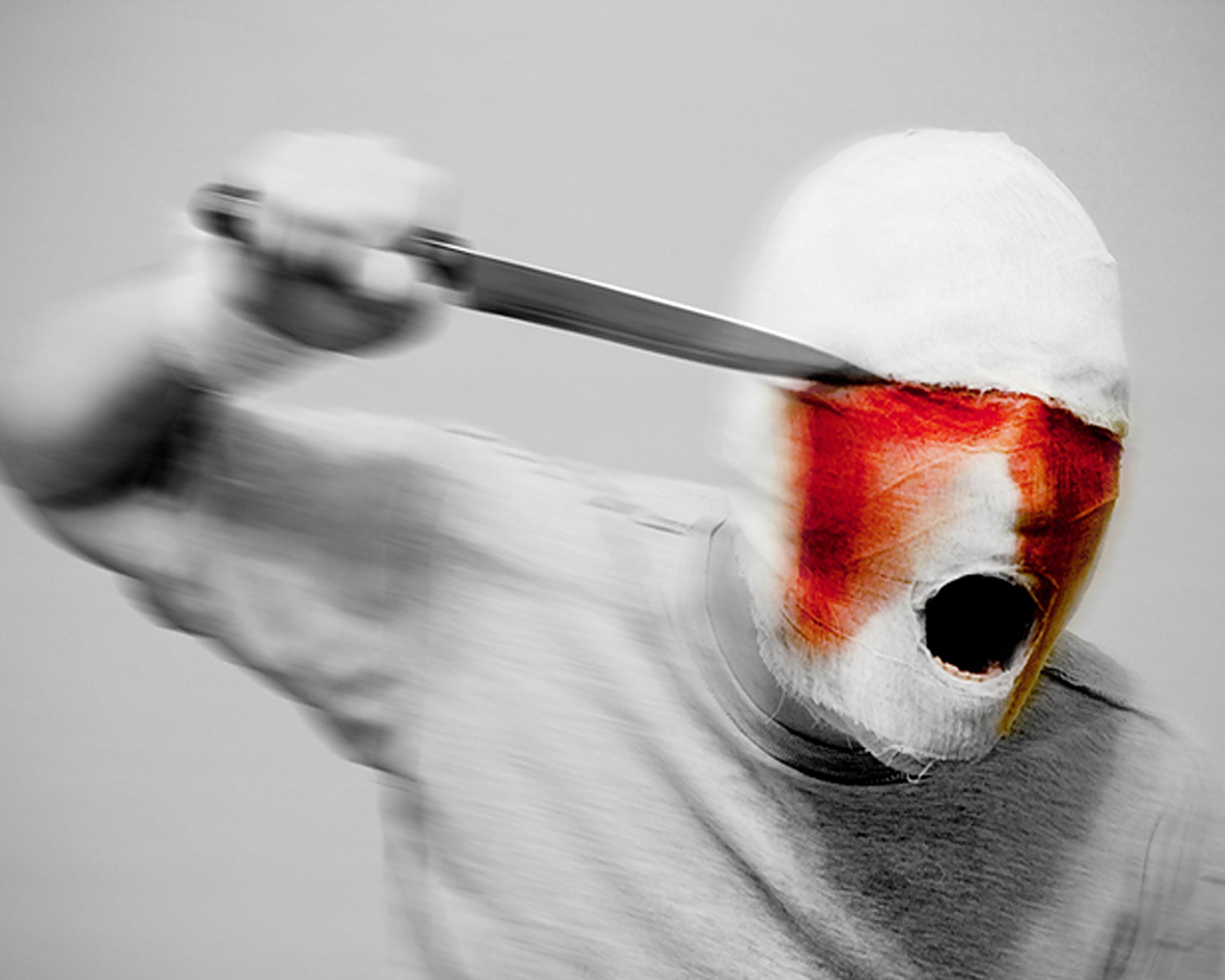 Creepy figure with knife and bloody bandages 4K HD Wallpaper