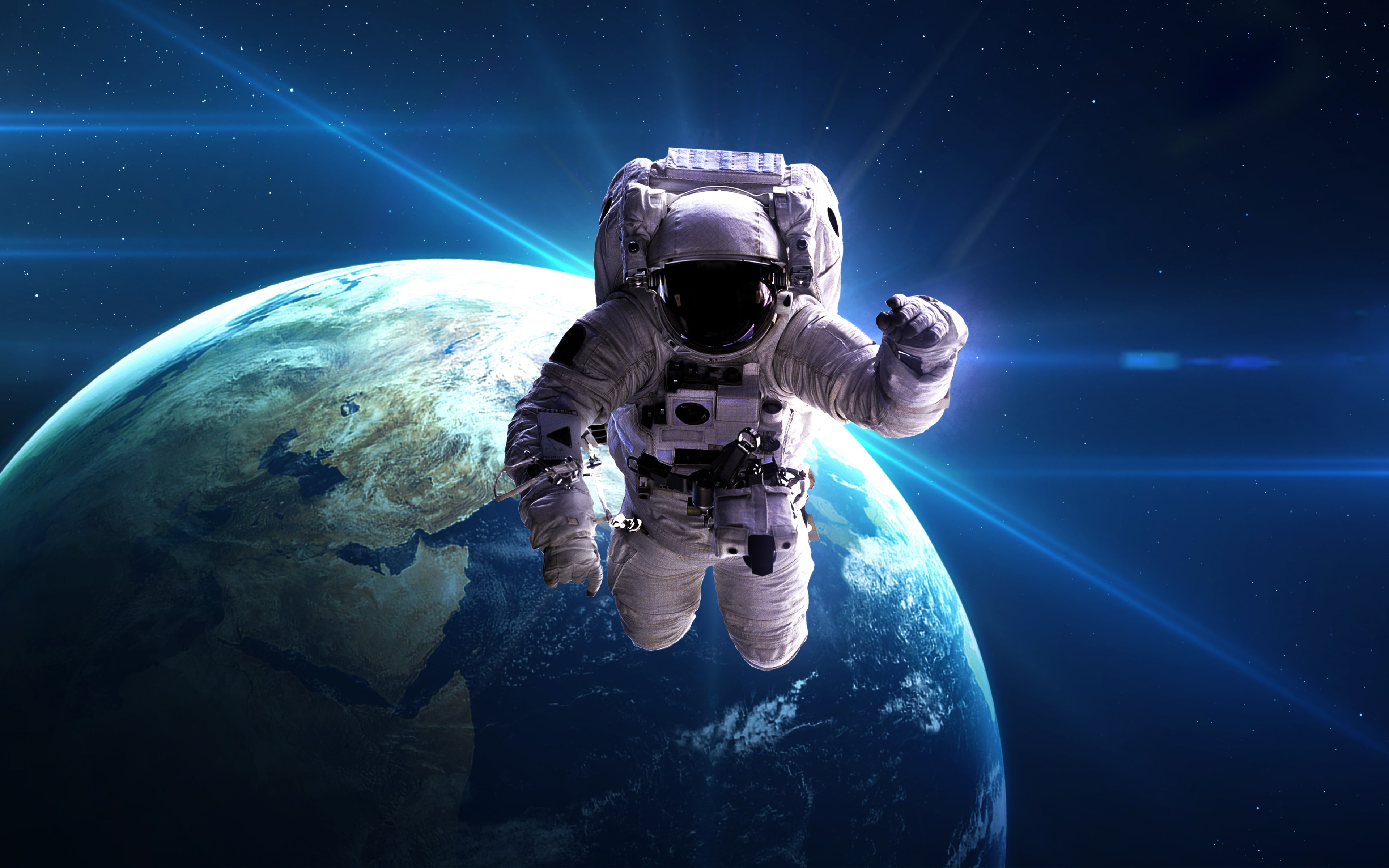 4K Astronaut Floating Above Earth in Space HD Wallpaper