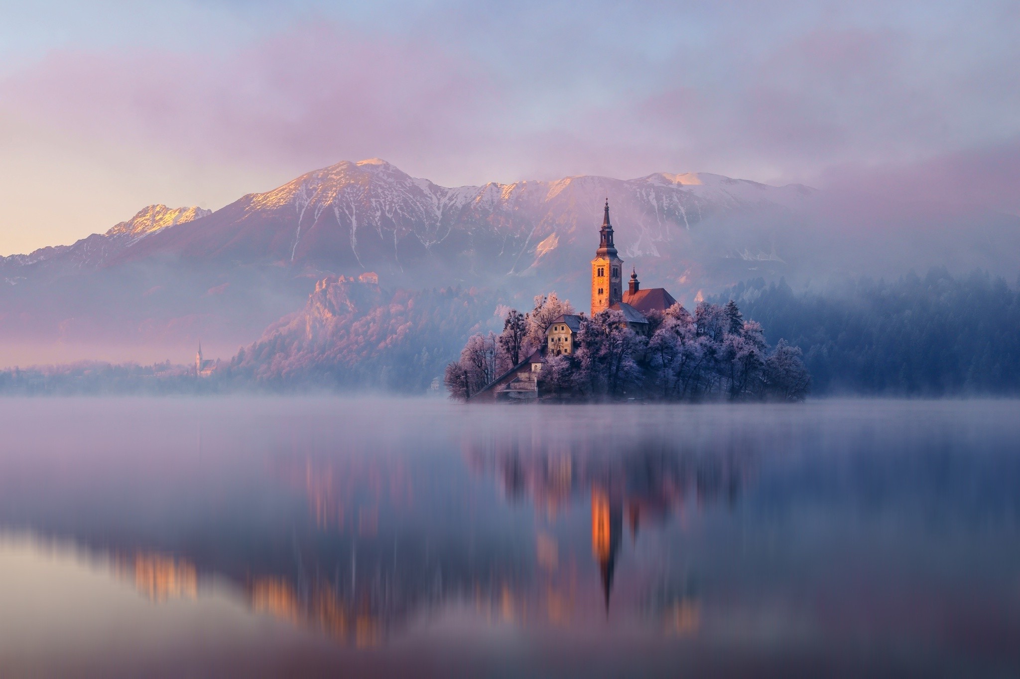 Church on island in Lake Bled, Slovenia at sunrise HD Wallpaper
