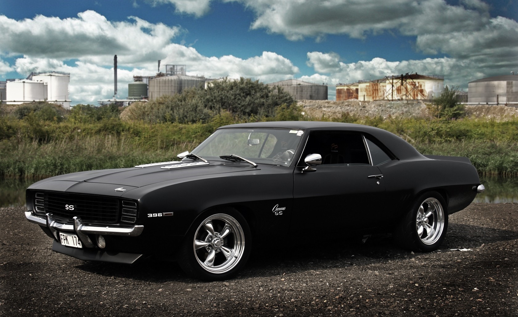Black 1969 Chevrolet Camaro SS parked outdoors HD Wallpaper