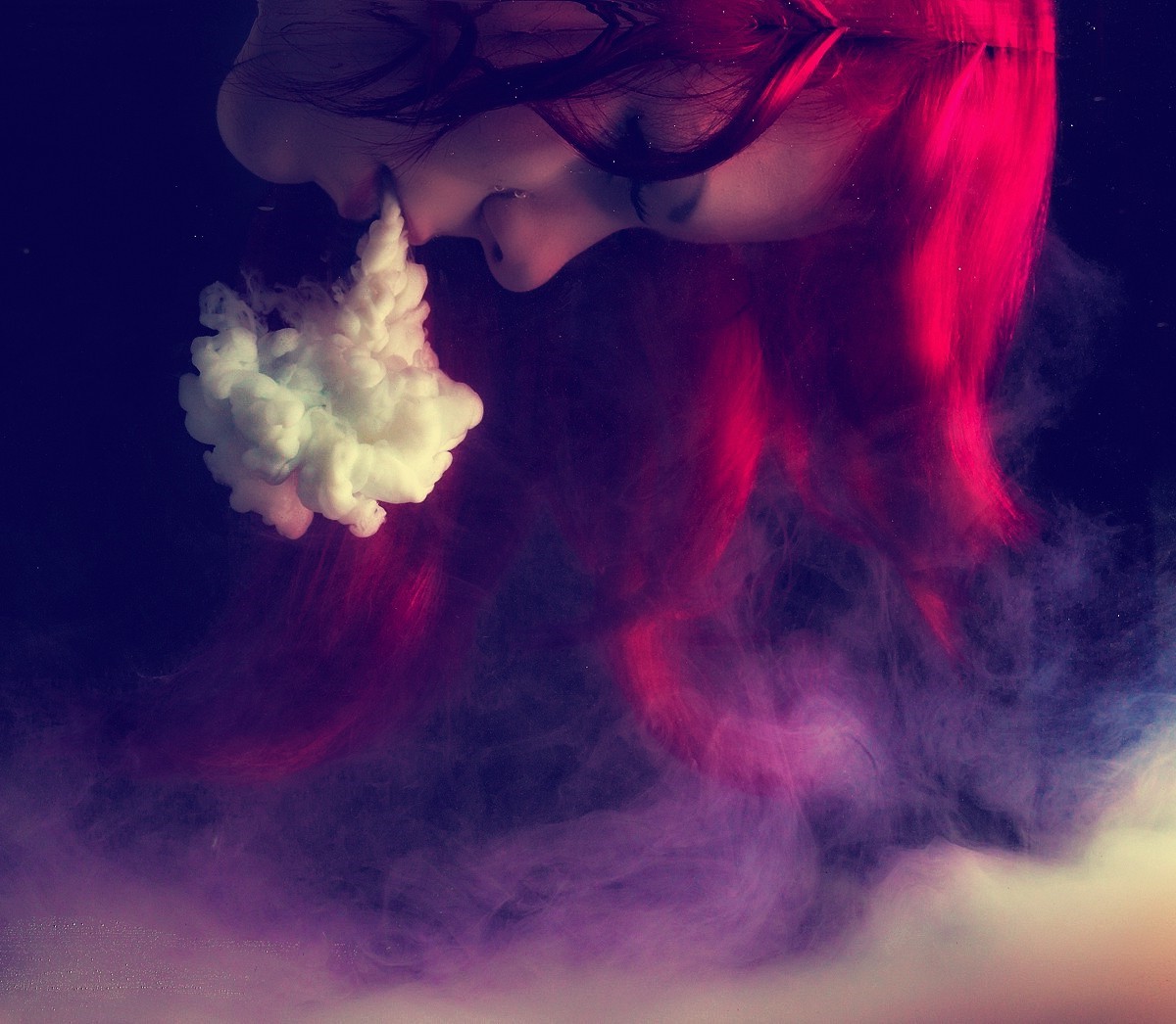 Woman exhaling smoke underwater HD Wallpaper
