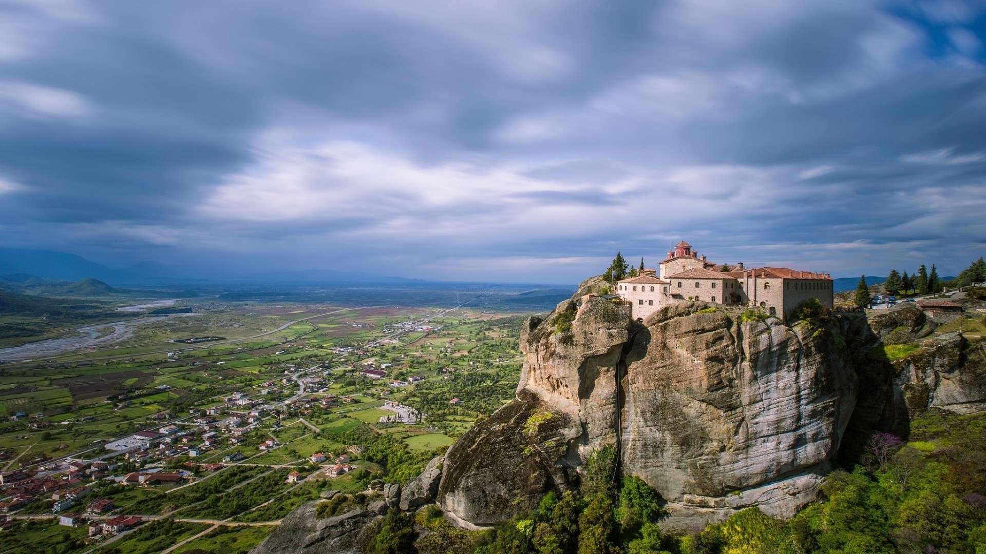 Monastery on Rocky Cliff Overlooking Green Valley Meteora HD Wallpaper