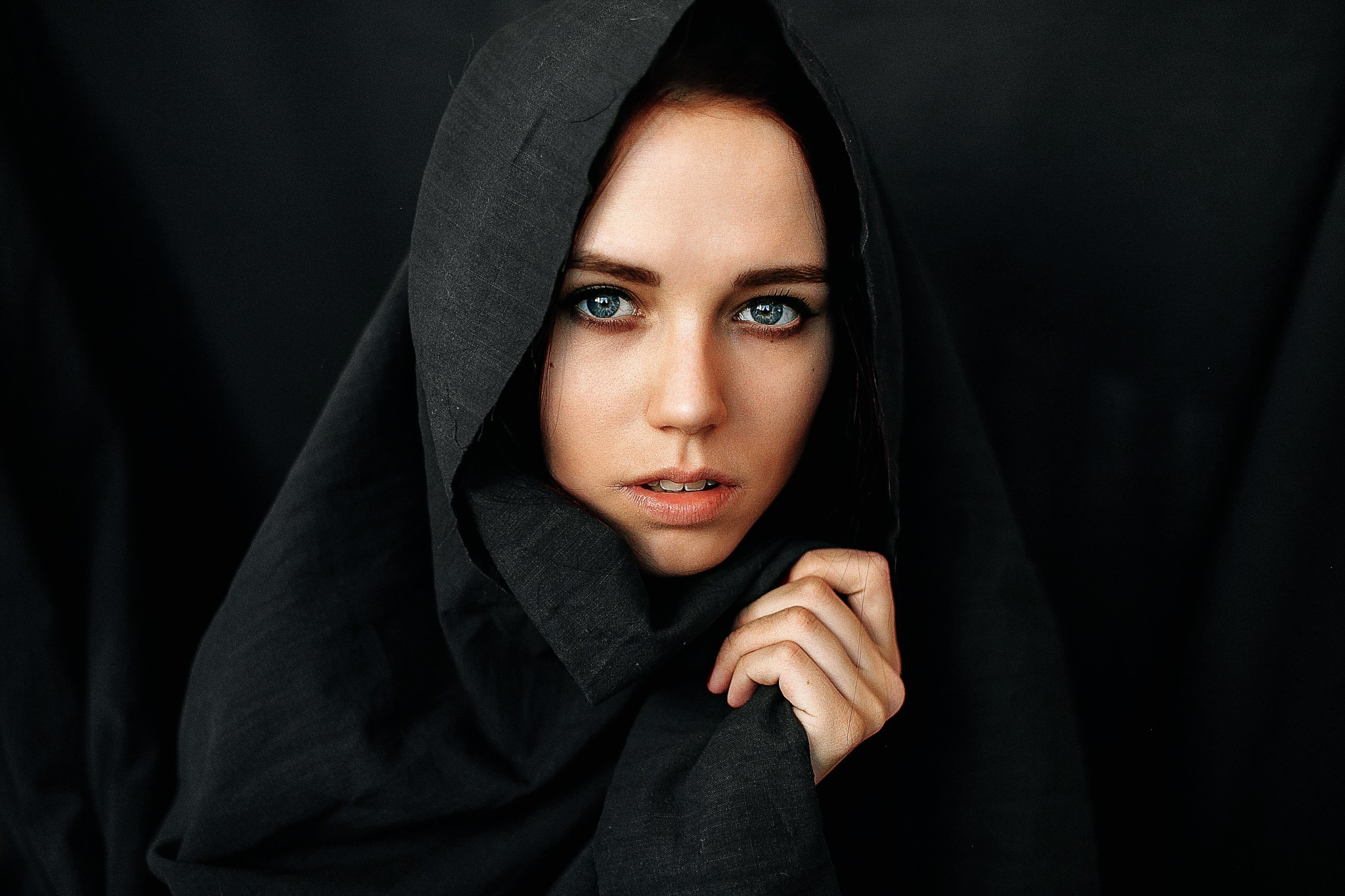 Woman in black headscarf looking at viewer HD Wallpaper