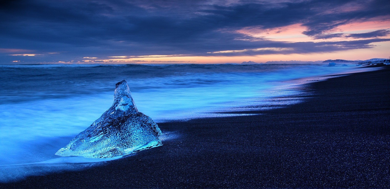 Iceberg on black sand beach at sunset, Iceland HD Wallpaper