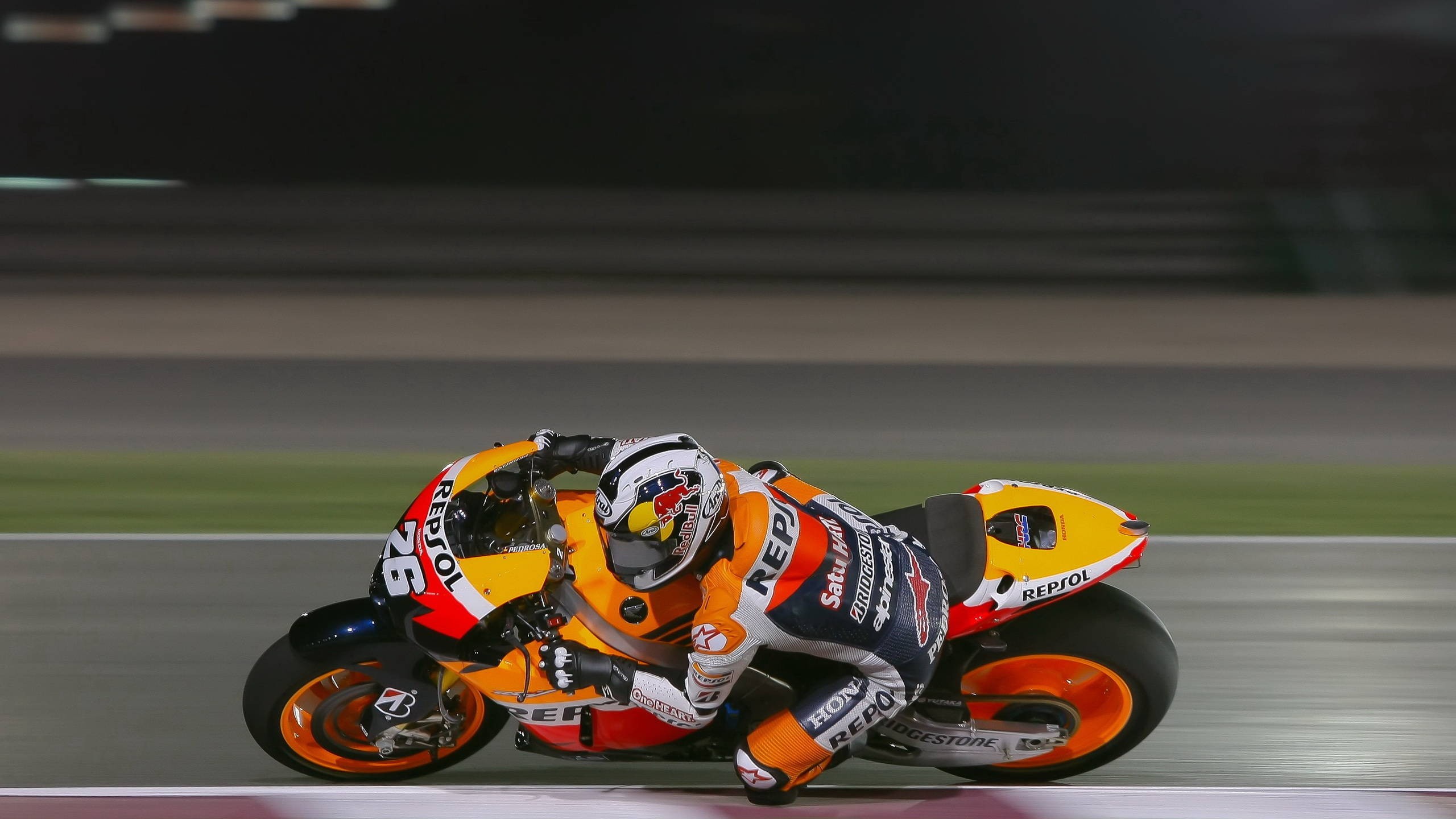 Dani Pedrosa on a Repsol Honda motorcycle HD Wallpaper