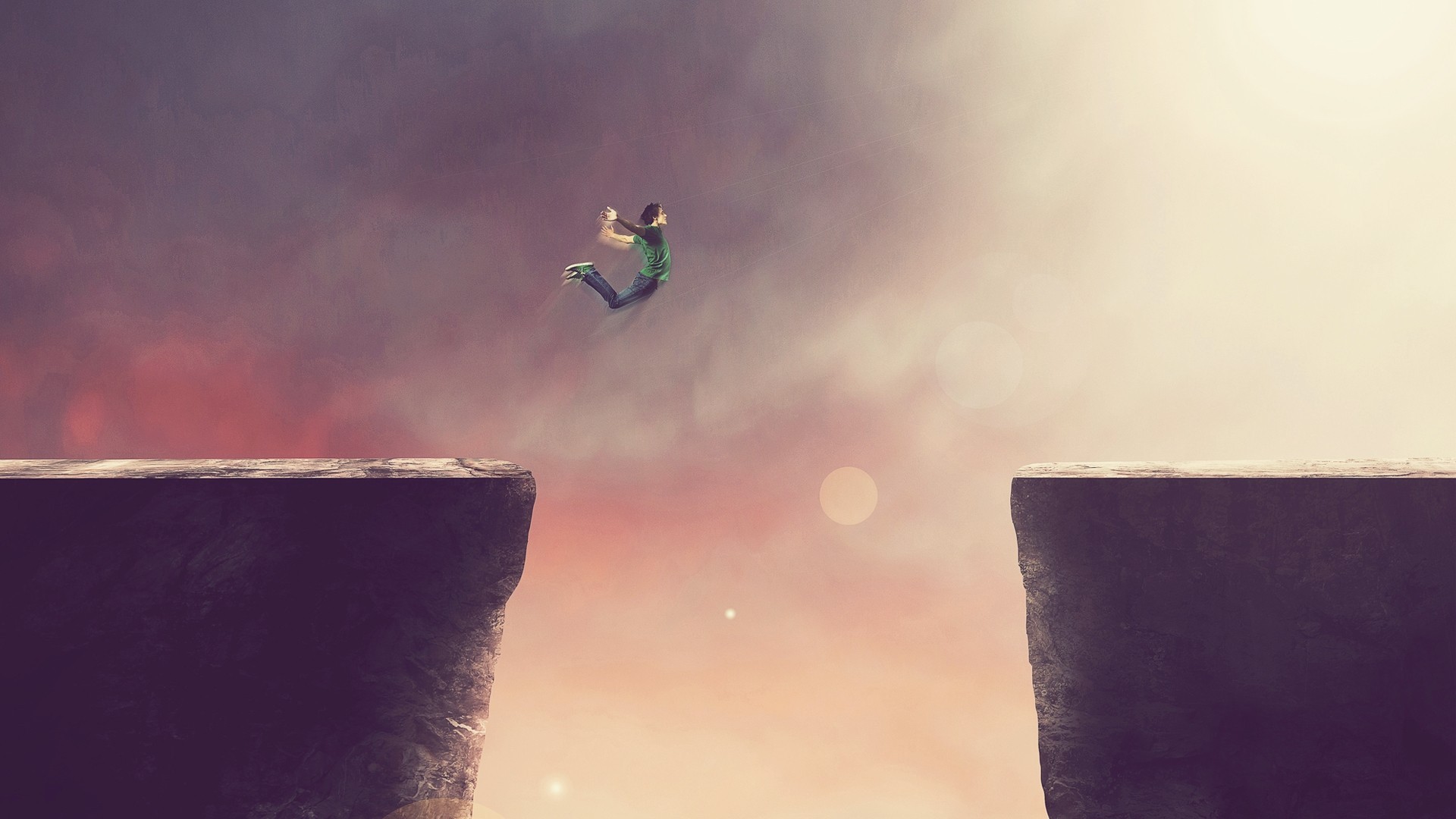 Man jumping between cliffs in a surreal sky HD Wallpaper