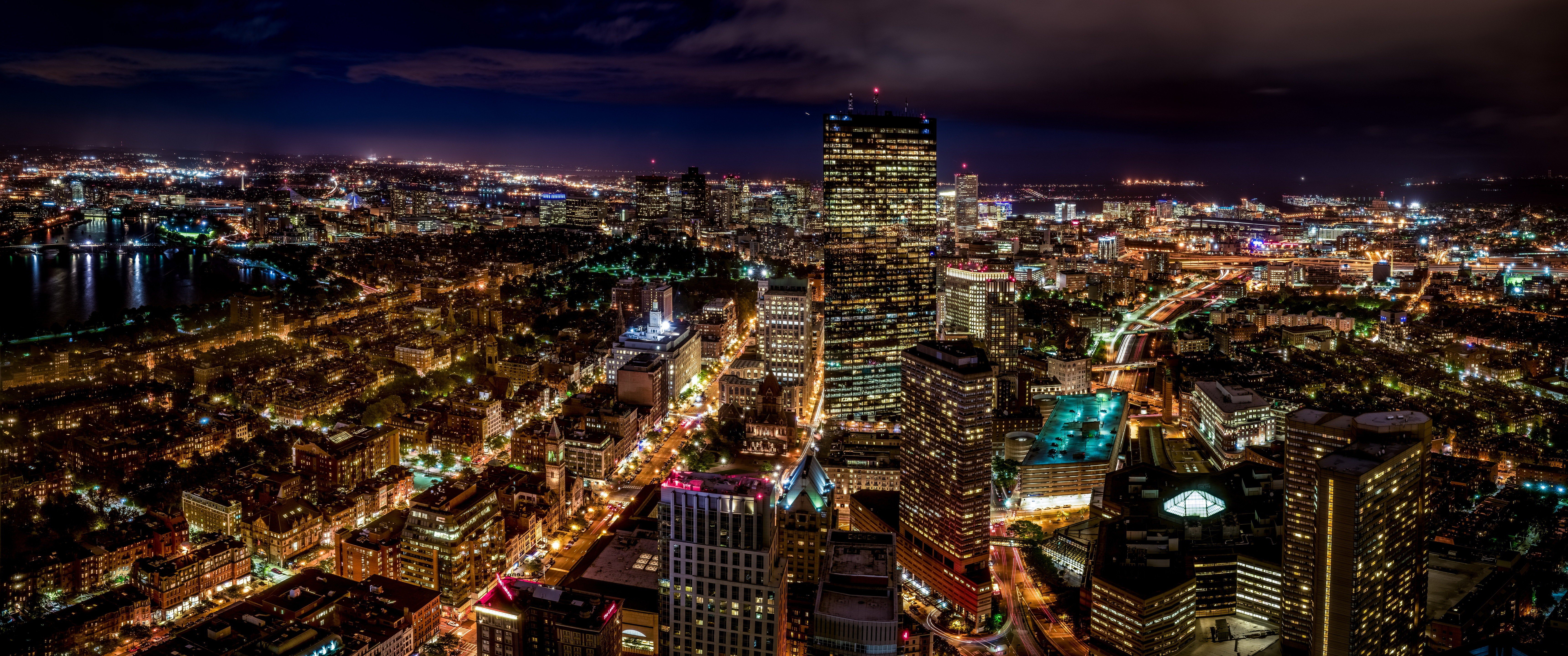 Boston cityscape at night with illuminated skyscrapers HD Wallpaper