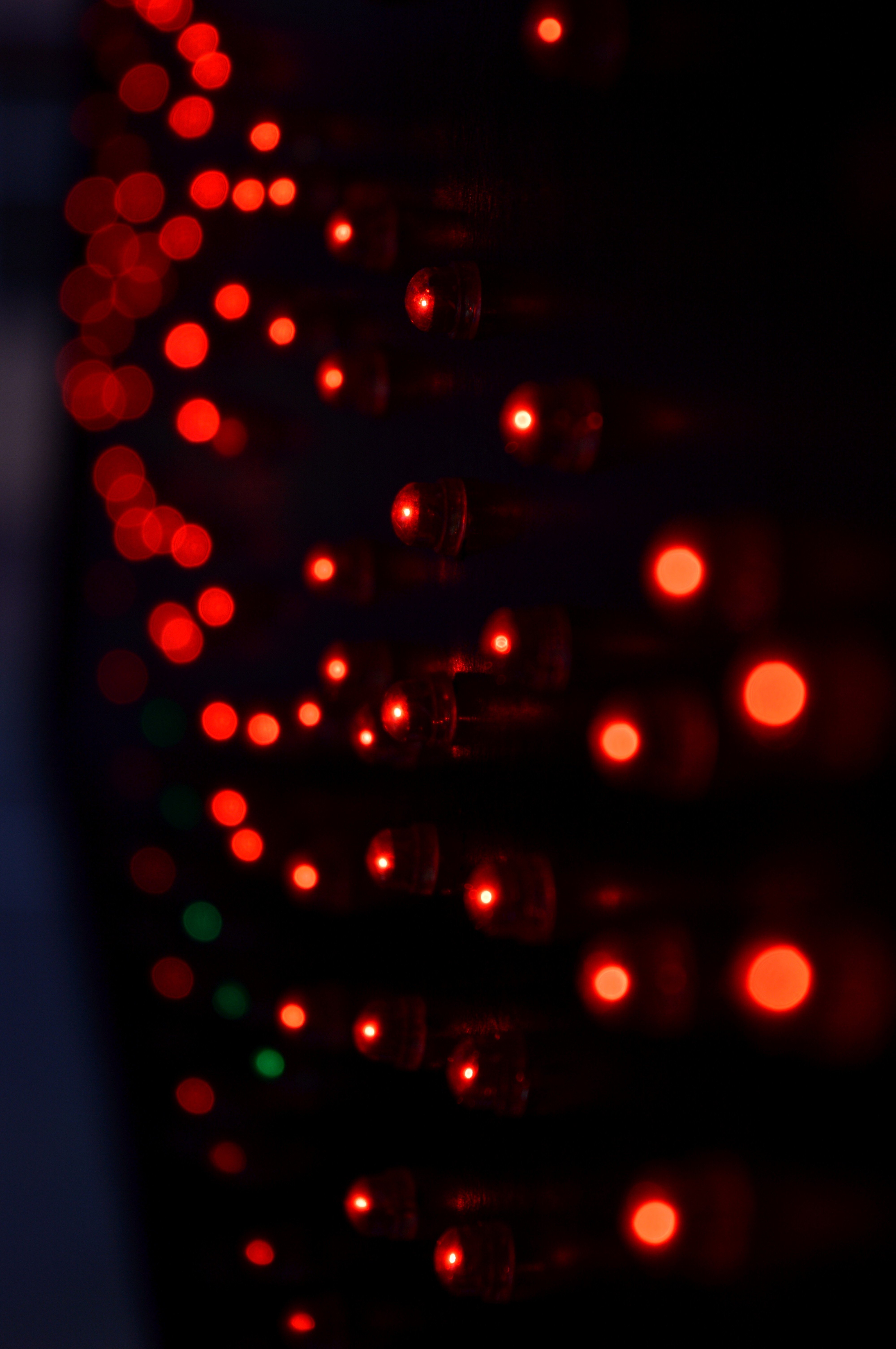 Blurred red and green LED lights on a dark background HD Wallpaper