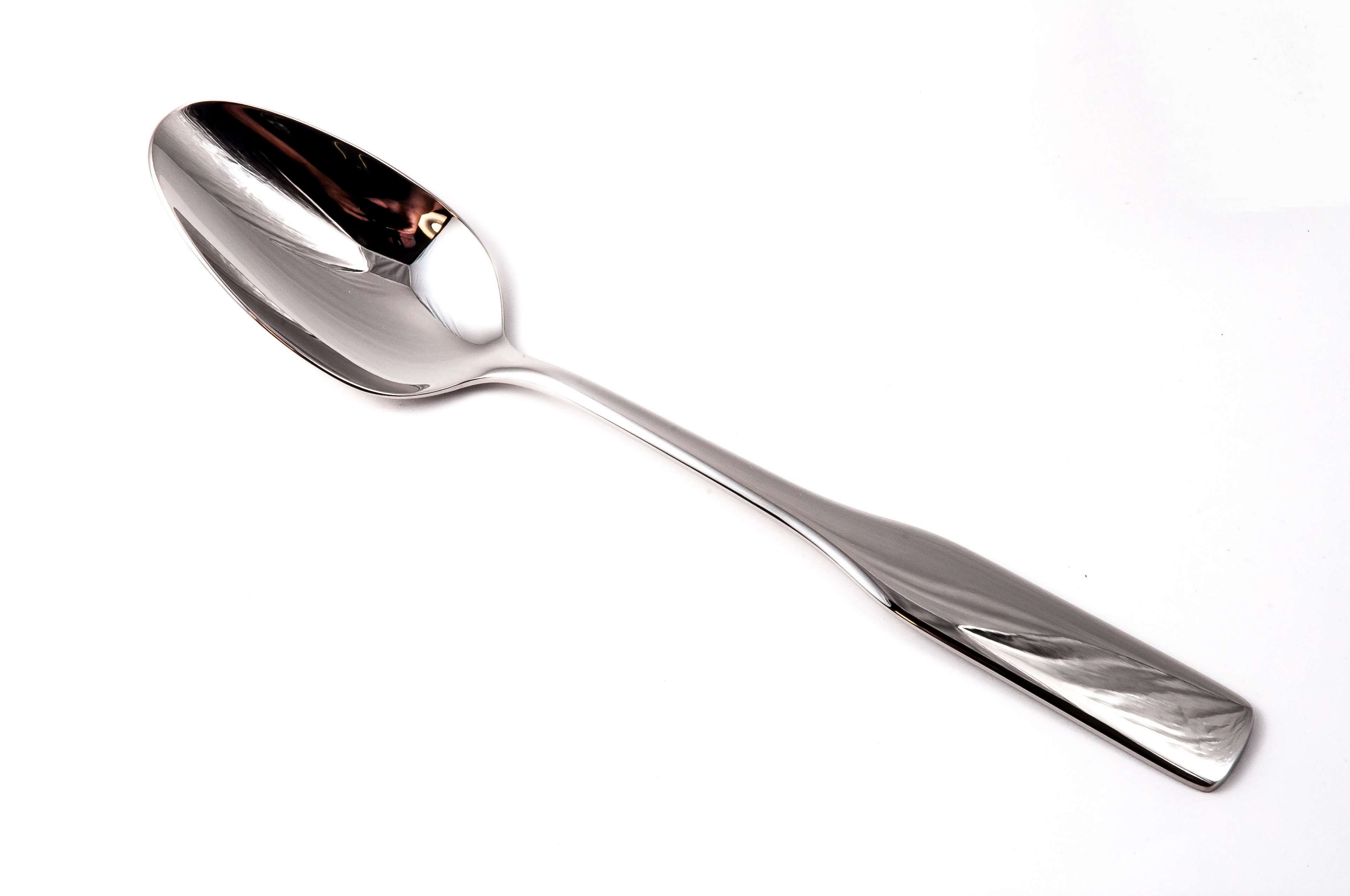 Shiny metal spoon on a white background HD Wallpaper