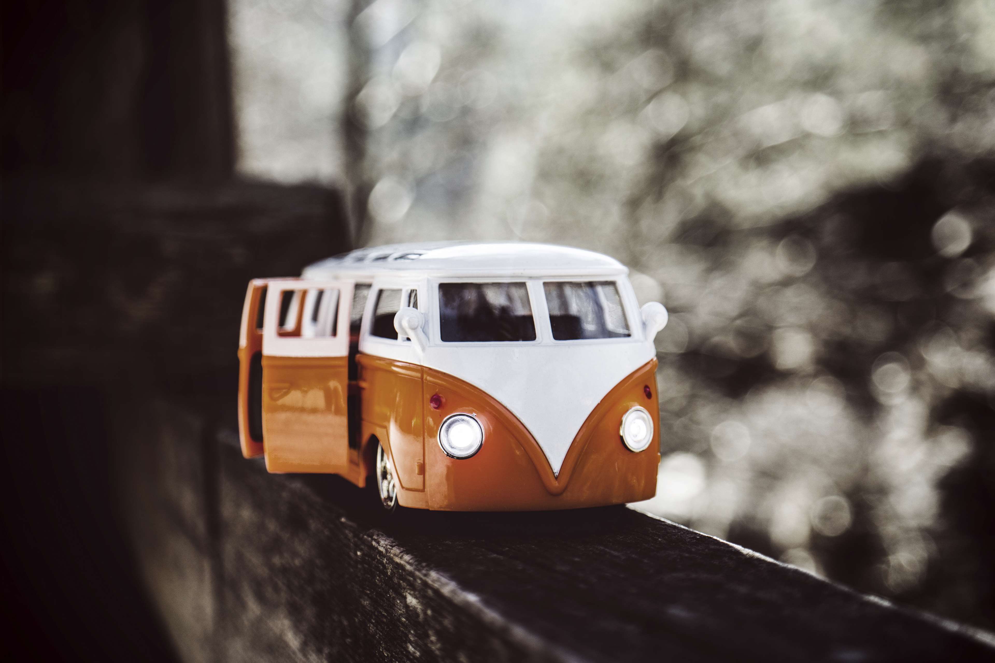 Orange and white toy camper van with open door HD Wallpaper