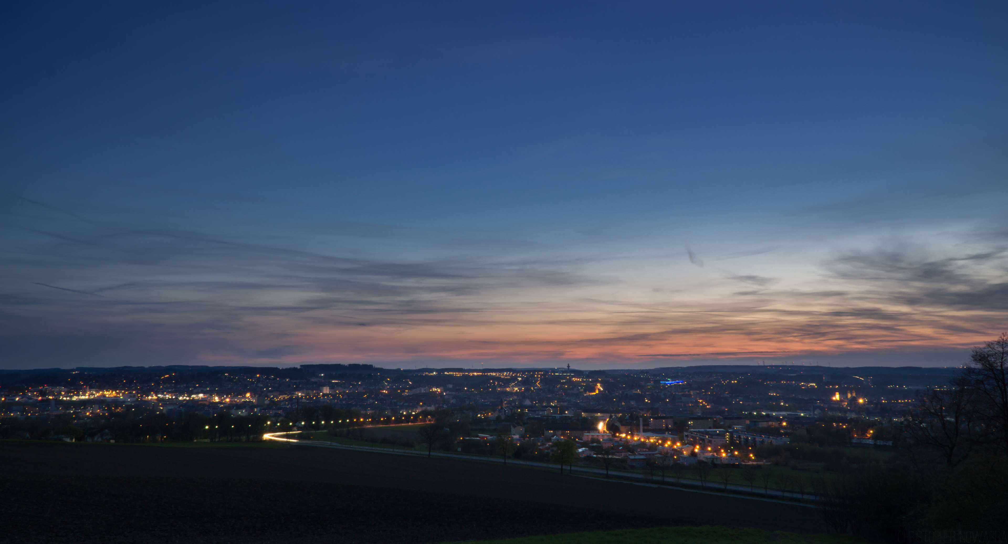 City lights at dusk with colorful sky 4K HD Wallpaper