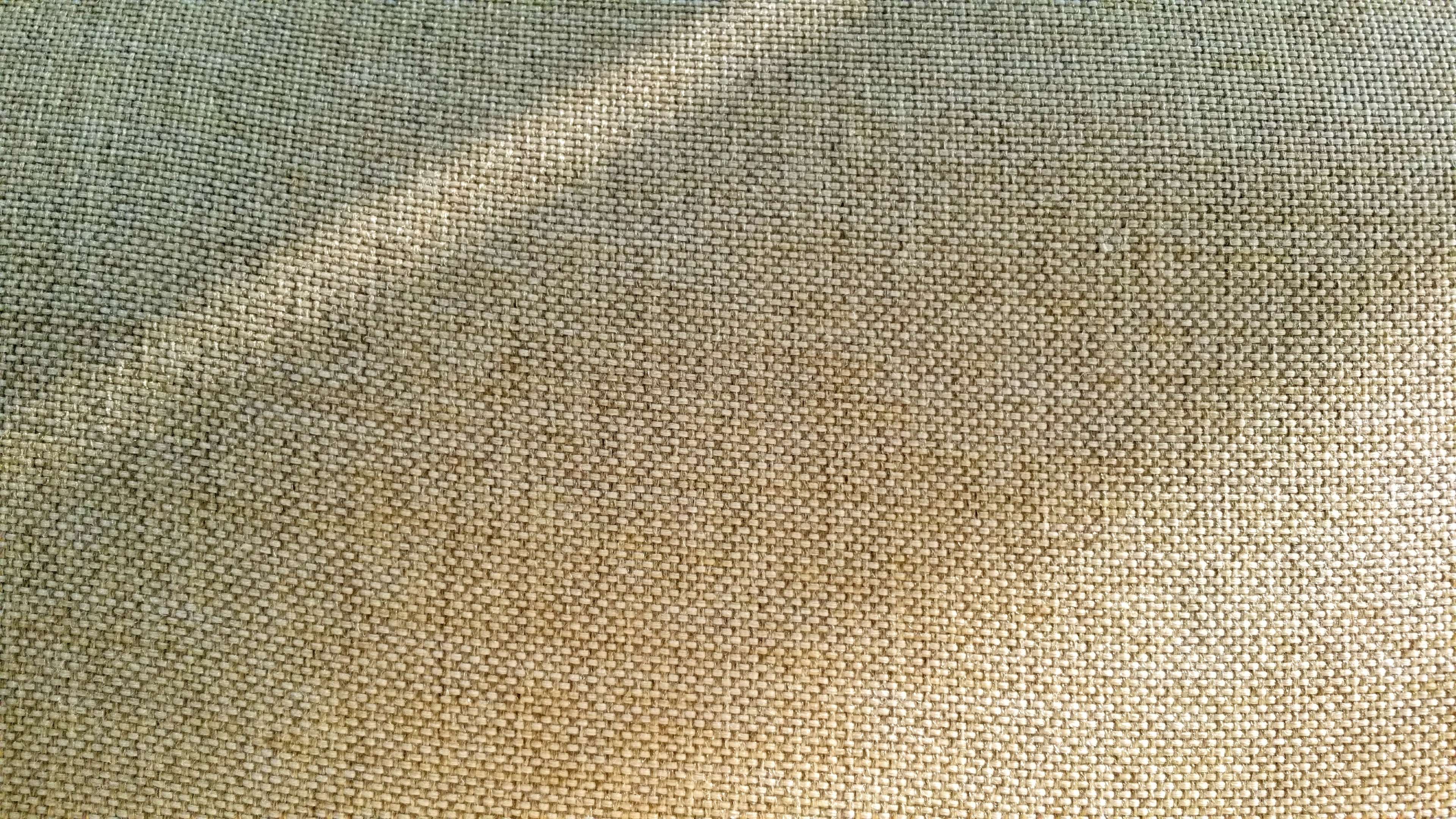 Close-up of textured fabric with light and shadow HD Wallpaper