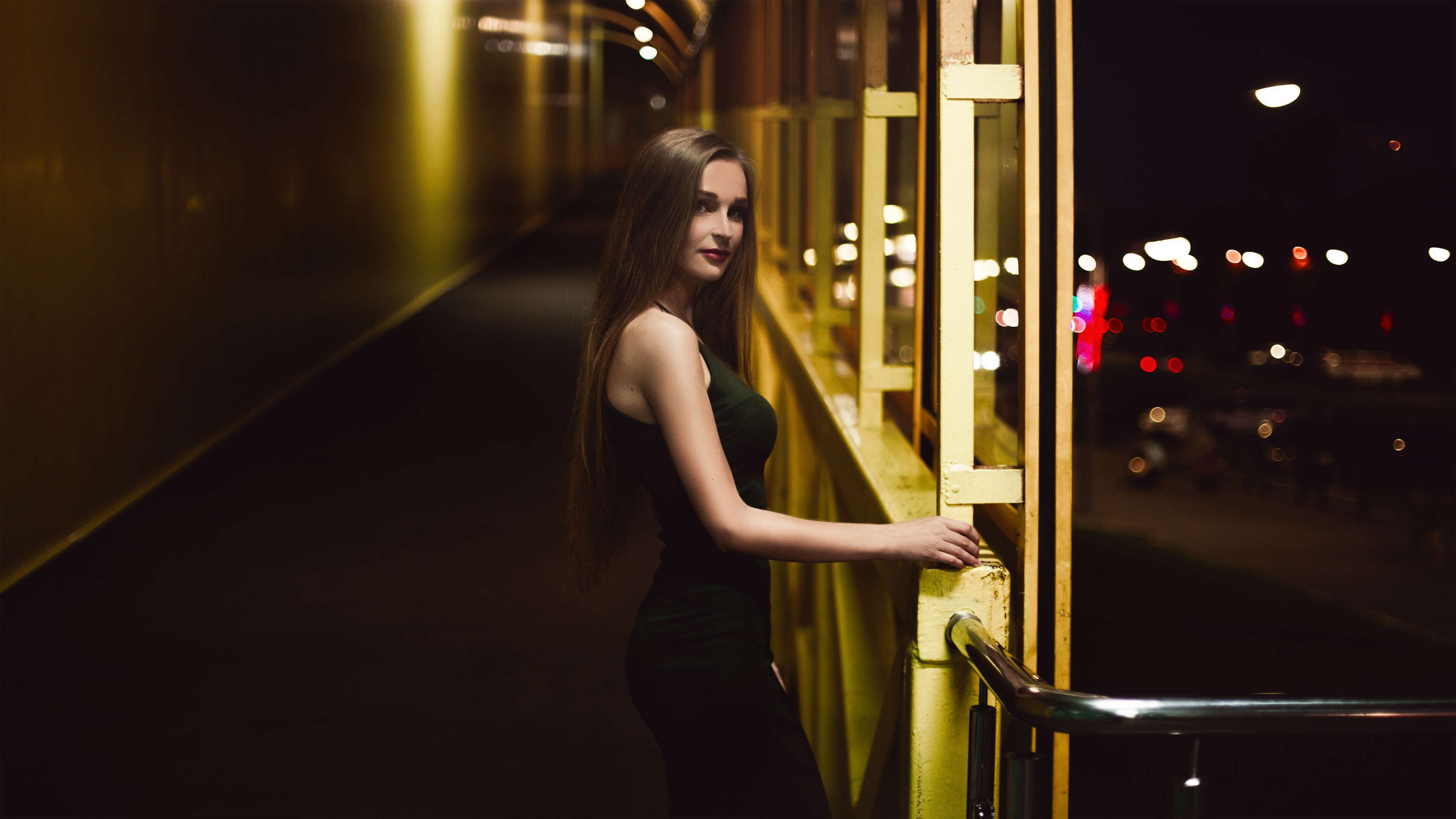 Woman posing on a pathway at night HD Wallpaper