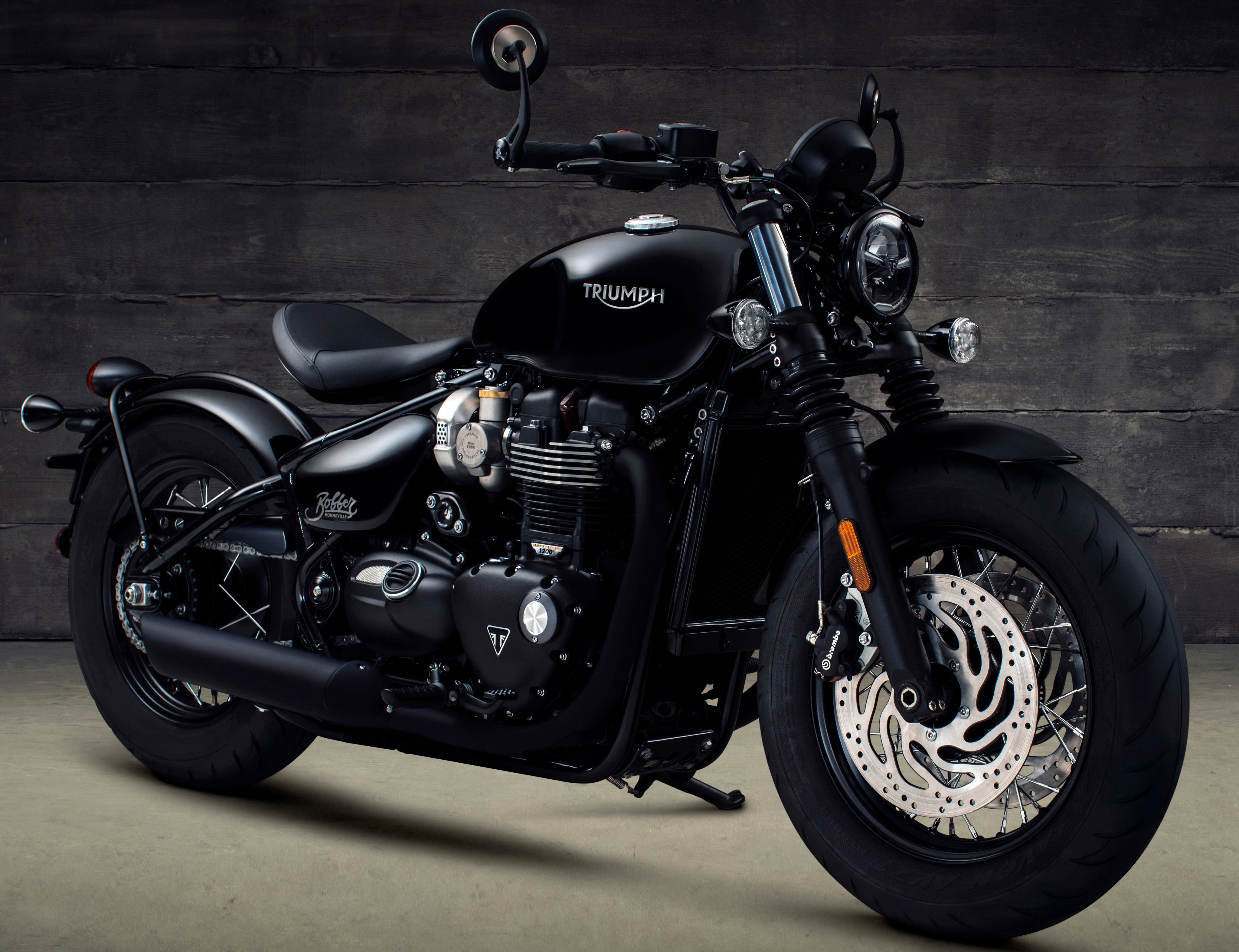 Black Triumph Bobber motorcycle HD Wallpaper